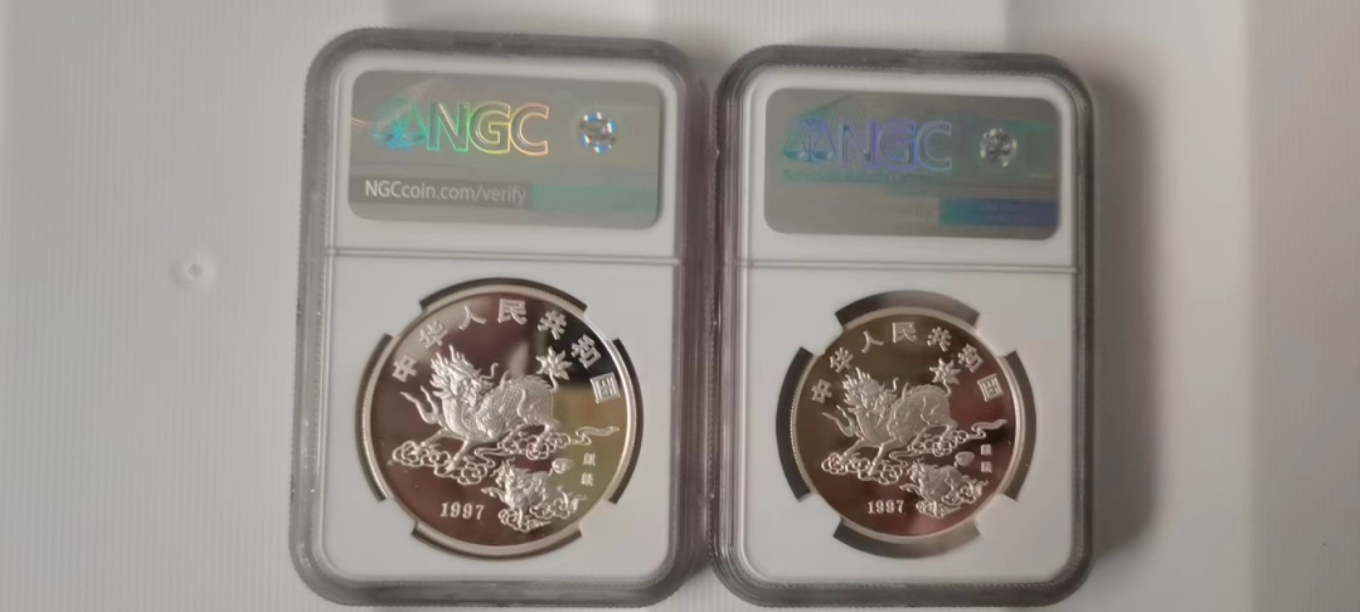 【华誉王者】2067期拍卖 1997年老银币，麒麟高分一对 NGC-MS68  老精稀的银币，数量非常少