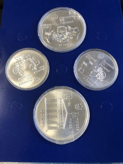 【海寧潮】拍卖第三十三期 - 【海寧潮】加拿大 1974年4枚 蒙特利尔奥运会普制银币套，大的925银，48.6克，直径45毫米，小的24.3克，925银，37毫米