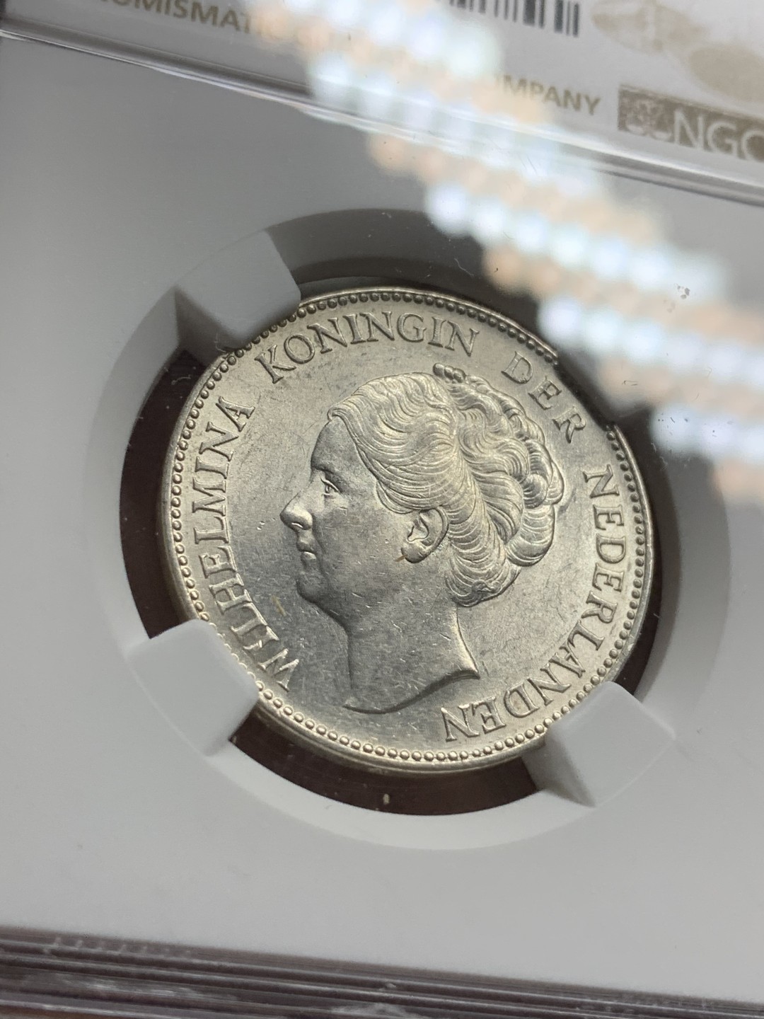 《竞宝斋》第75场-本周日，周一2场连拍（全场不限金额包邮） NGC-MS62 荷兰1940年 威廉米娜女王 1盾银币 转光好品