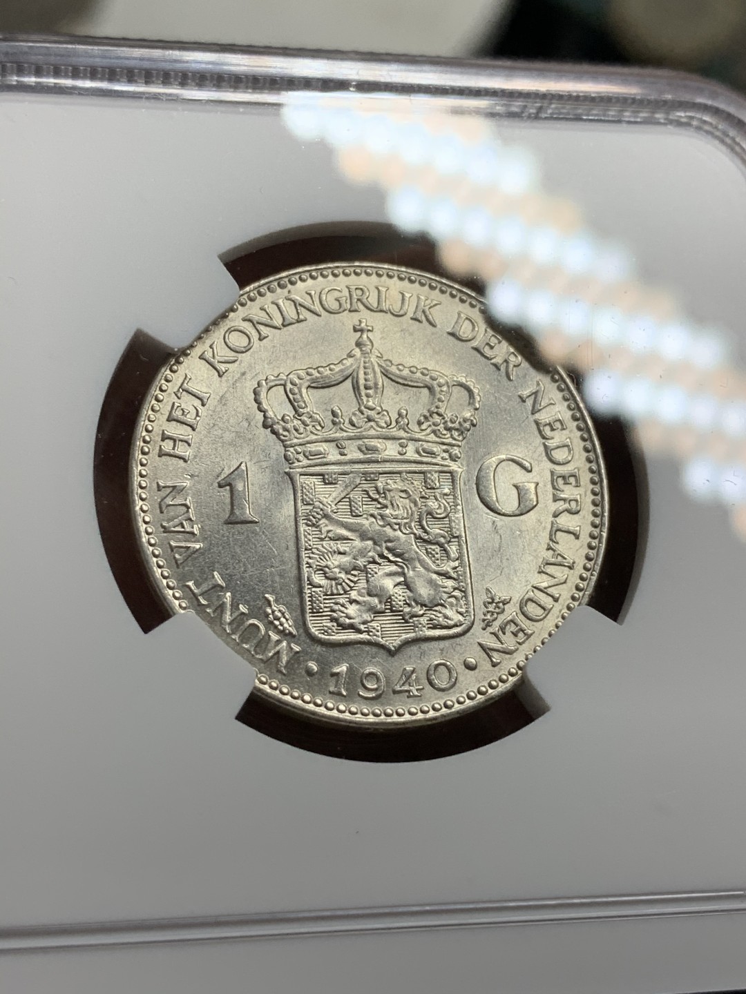 《竞宝斋》第75场-本周日，周一2场连拍（全场不限金额包邮） NGC-MS62 荷兰1940年 威廉米娜女王 1盾银币 转光好品