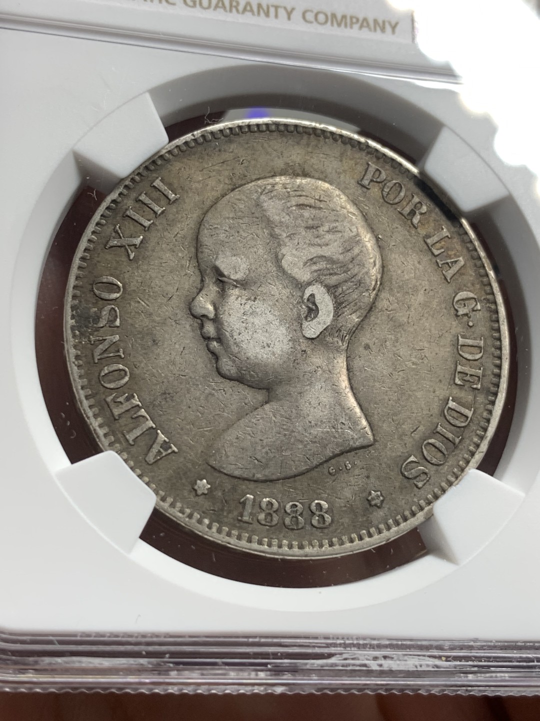 《竞宝斋》第76场-本周日，周一2场连拍（全场不限金额包邮） NGC-XF40 西班牙 1888年 阿方索十三世光头版 5比塞塔双柱大银币 发财年份