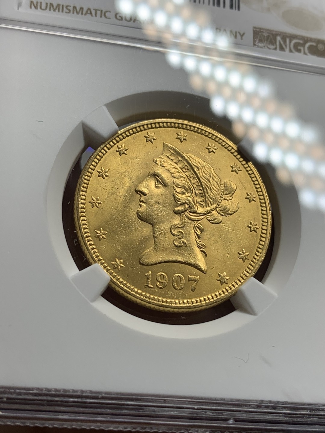《竞宝斋》第76场-本周日，周一2场连拍（全场不限金额包邮） NGC-MS62 美国 1907年 老鹰 10美元金币 早期自由女神头像 一流的品相 非常少见