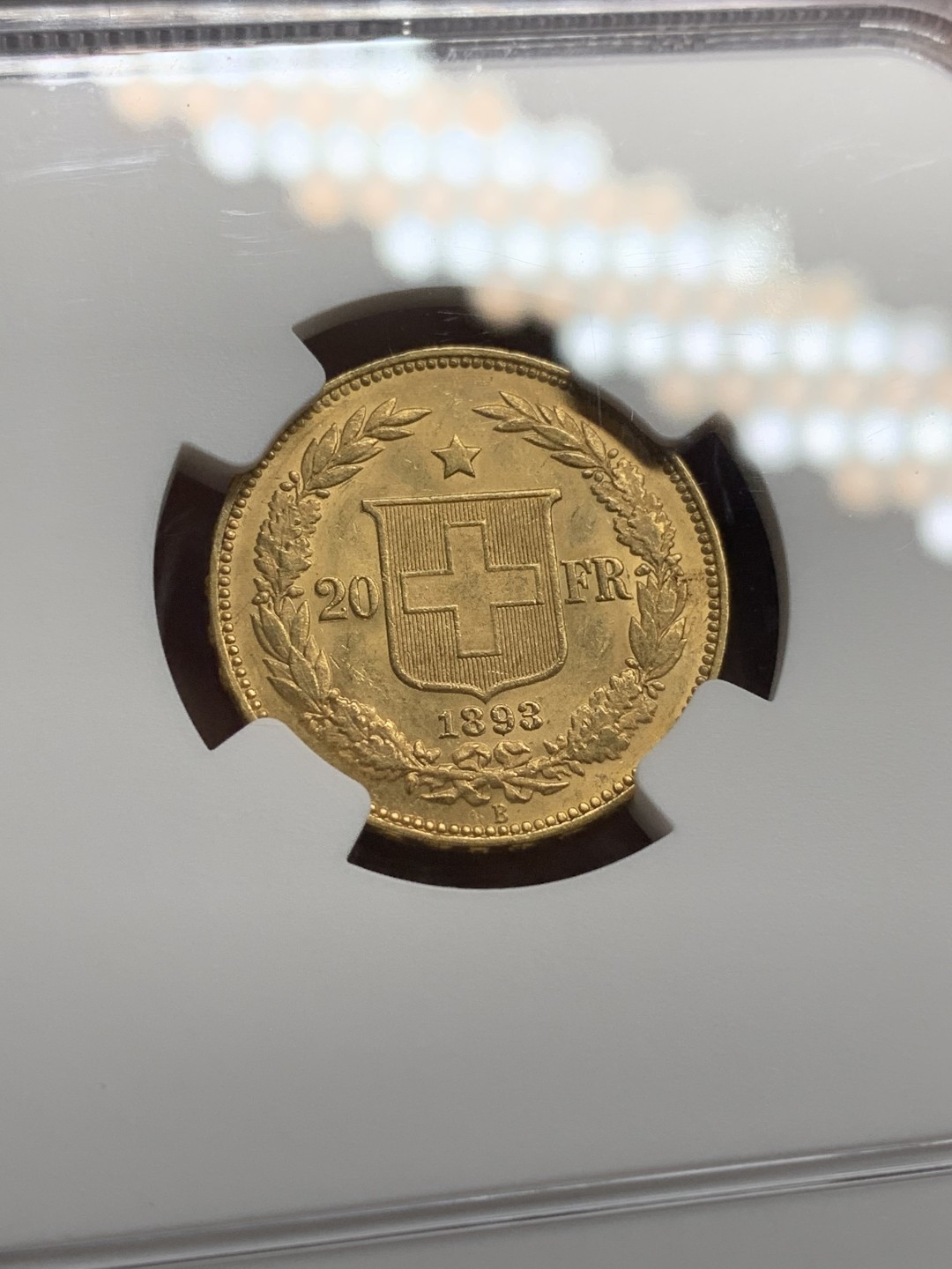 《竞宝斋》第76场-本周日，周一2场连拍（全场不限金额包邮） NGC-MS62 瑞士1893年 早期女人头像 20法郎金币 稀少的早期版 能上MS就更加难了