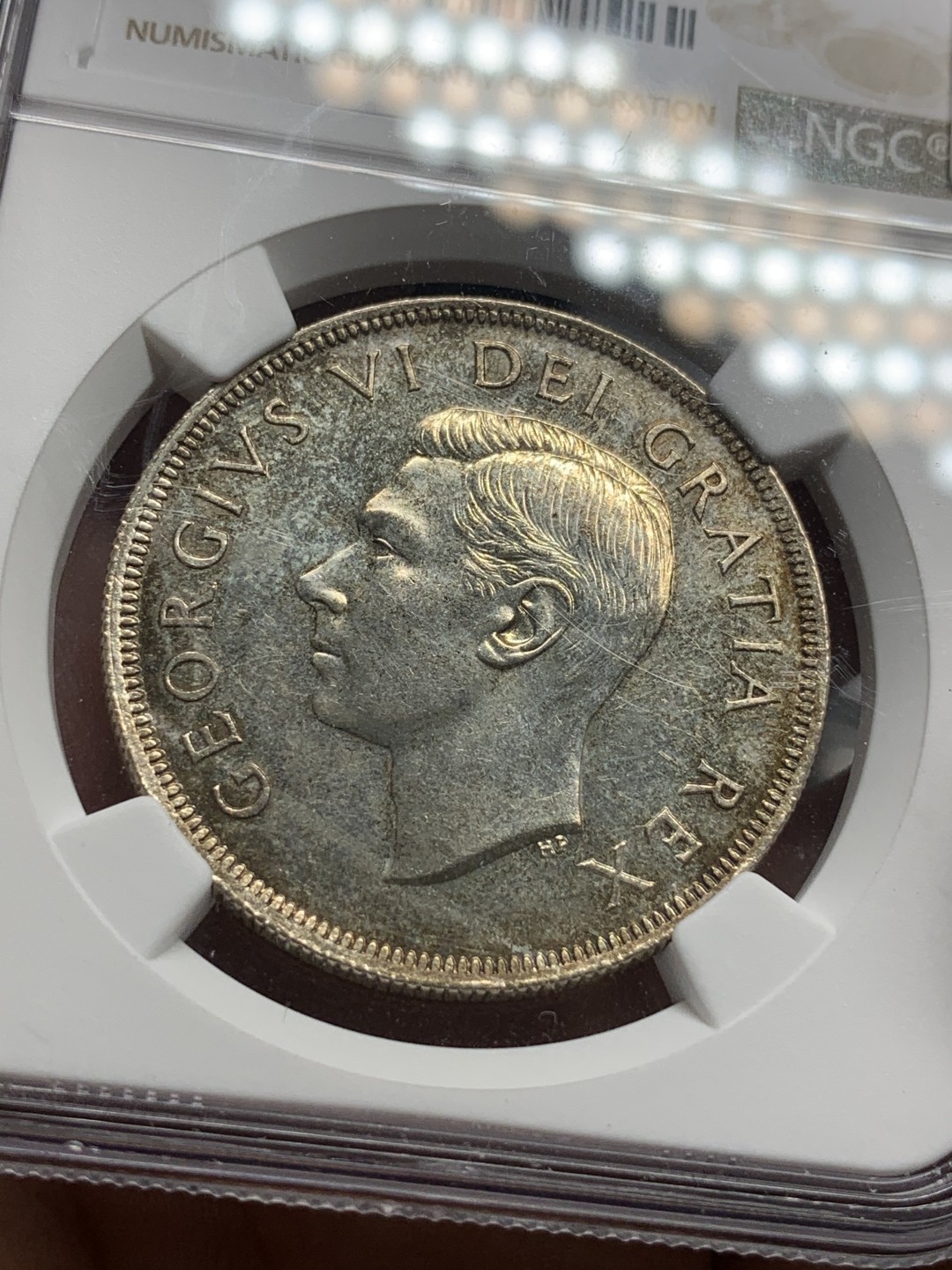 《竞宝斋》第76场-本周日，周一2场连拍（全场不限金额包邮） NGC-MS62 加拿大 1949年1元 纽芬兰加入联邦纪念银币 金黄色包浆细节清晰