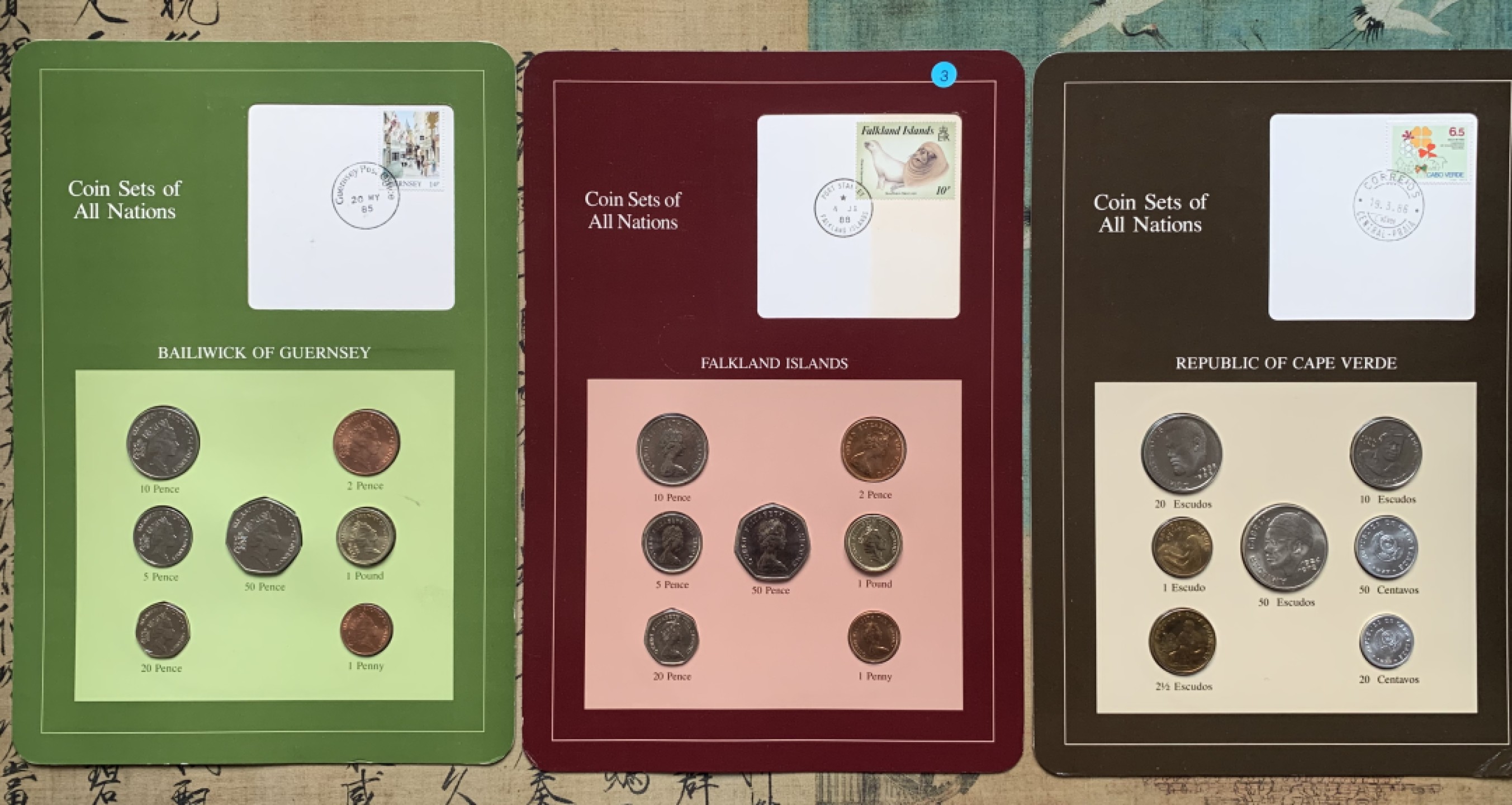 《竞宝斋》第76场-本周日，周一2场连拍（全场不限金额包邮） 3套一组 佛得角套币UNC共7枚+福克兰群岛1987年清年份套币全套+根西岛1985年清年份全套，富兰克林精选品种