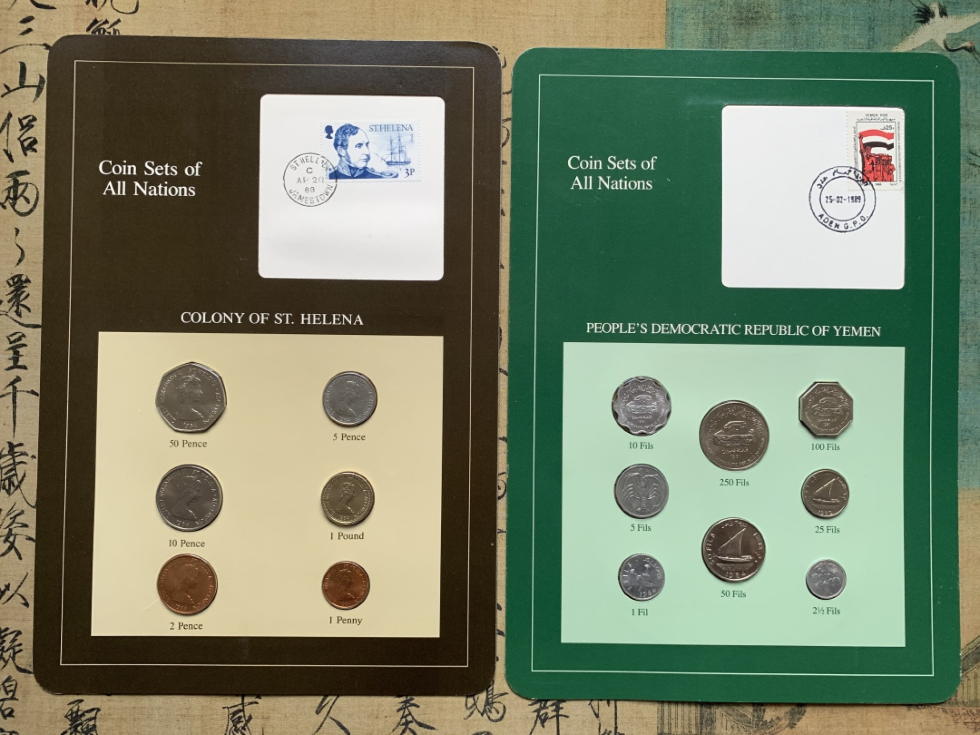 《竞宝斋》第76场-本周日，周一2场连拍（全场不限金额包邮） 2套一组 南也门1981年套币UNC共8枚+圣赫勒拿1984年清年份套币全套，富兰克林精选品种