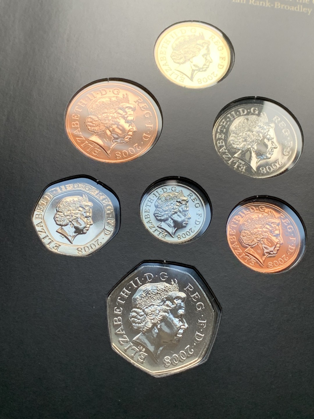 《竞宝斋》第76场-本周日，周一2场连拍（全场不限金额包邮） 原包装英国2008年7枚套币 精美拼图盾徽设计