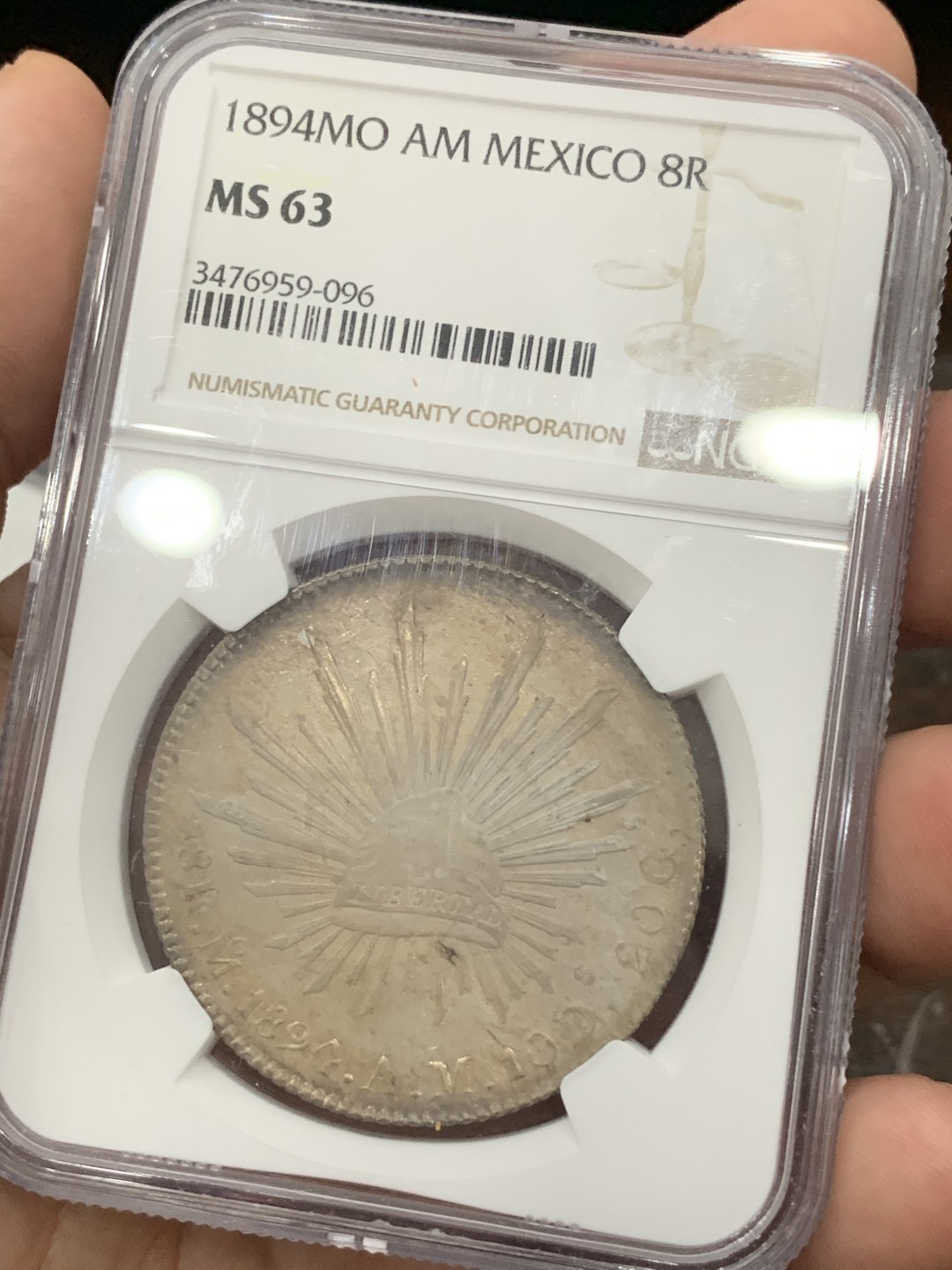 《竞宝斋》第76场-本周日，周一2场连拍（全场不限金额包邮） NGC MS63墨西哥1894年花边鹰洋8R银币 味道币一枚 底光 包浆 皆有