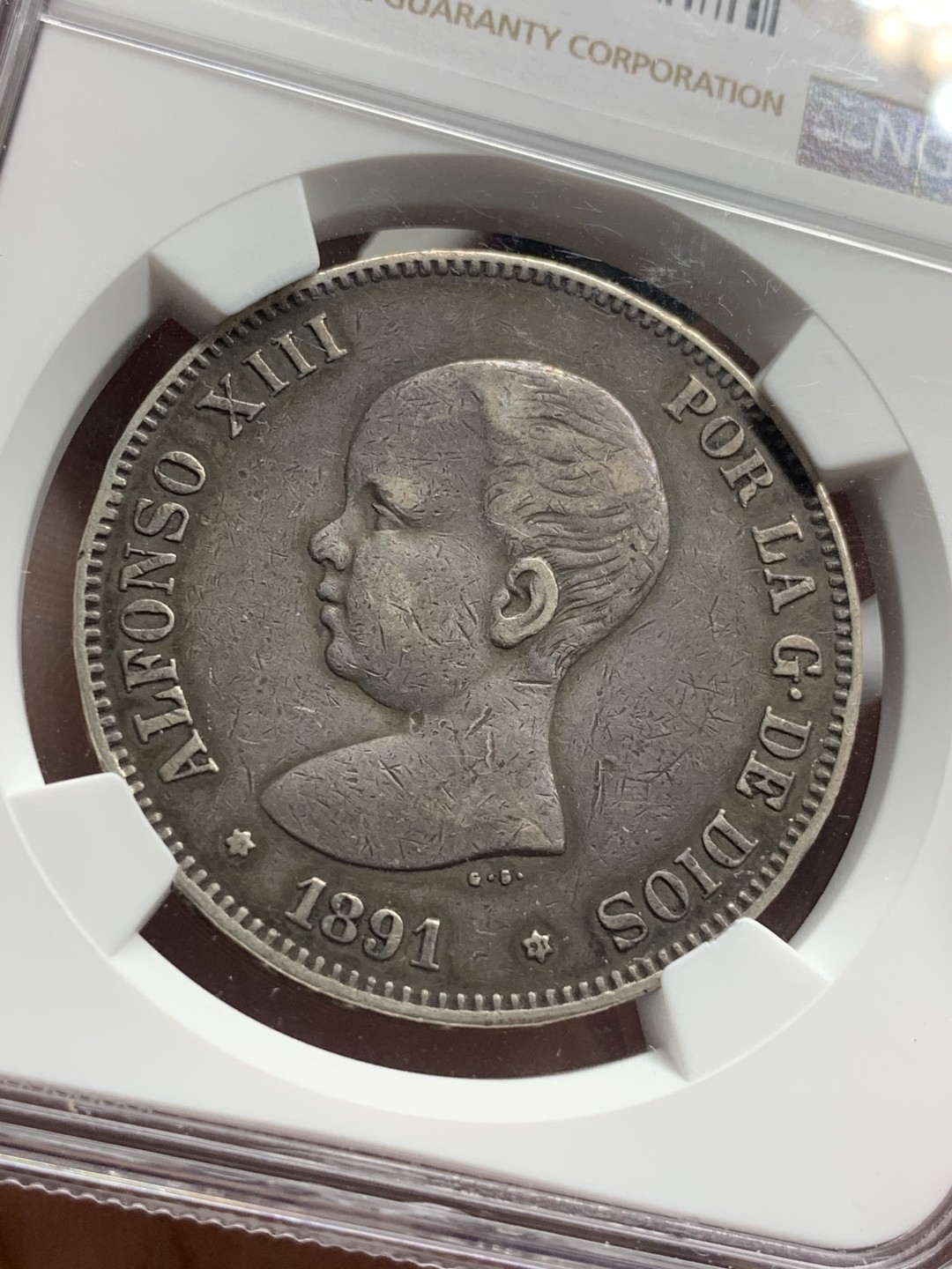 《竞宝斋》第76场-本周日，周一2场连拍（全场不限金额包邮） NGC XF40  西班牙 1891年阿方索十三世5比塞塔银币 醇黑包浆好品