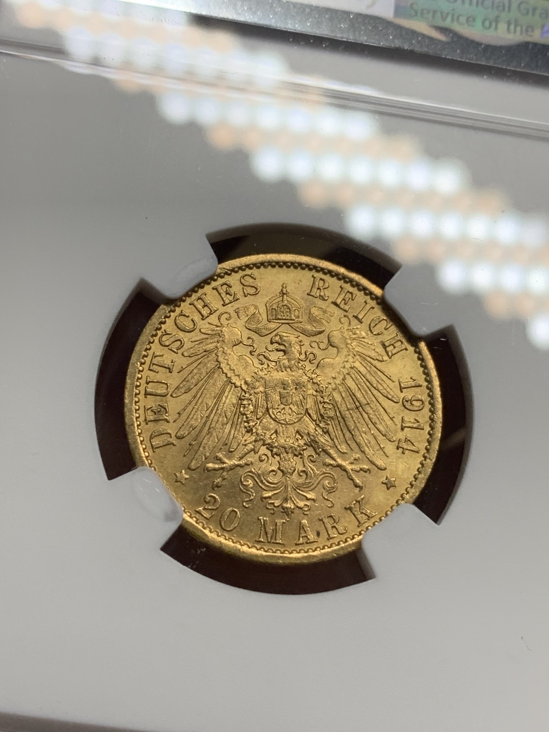 《竞宝斋》第76场-本周日，周一2场连拍（全场不限金额包邮） NGC-MS61 德国普鲁士 1914年 威廉二世军装版 20马克金币 很漂亮的转光