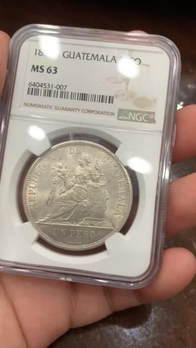 《竞宝斋》第77场-本周日，周一，周四3场拍卖（全场不限金额包邮） NGC MS63危地马拉1894坐人1比索 NGC第三名 南美洲的币暴涨 BU品相，原光车轮光