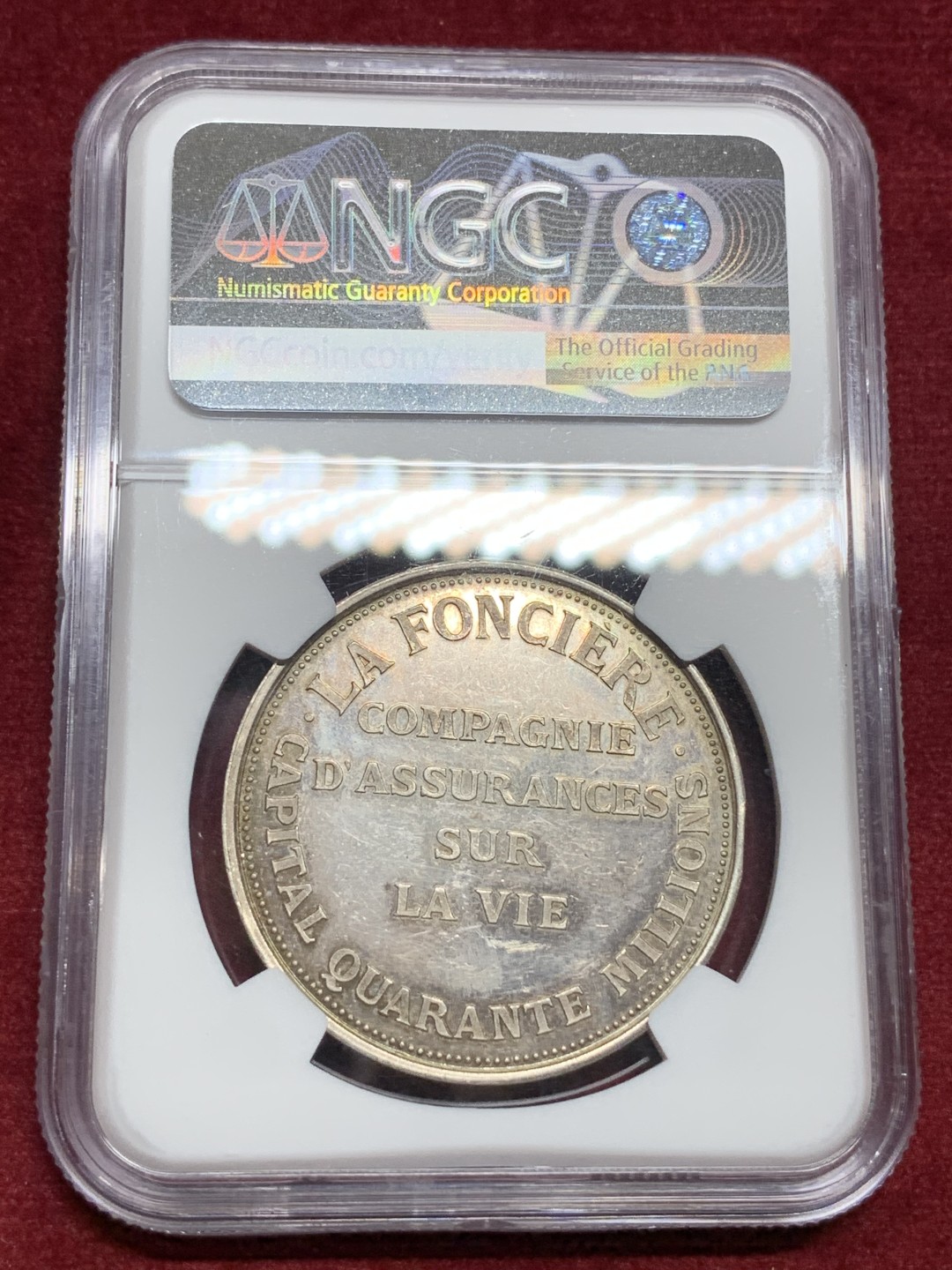 《竞宝斋》第77场-本周日，周一，周四3场拍卖（全场不限金额包邮） NGC MS61法国保险公司女神银章直径:37mm重量:22.68g 边铭:丰饶角+银标章面有点镜面效果，女神细节漂亮
