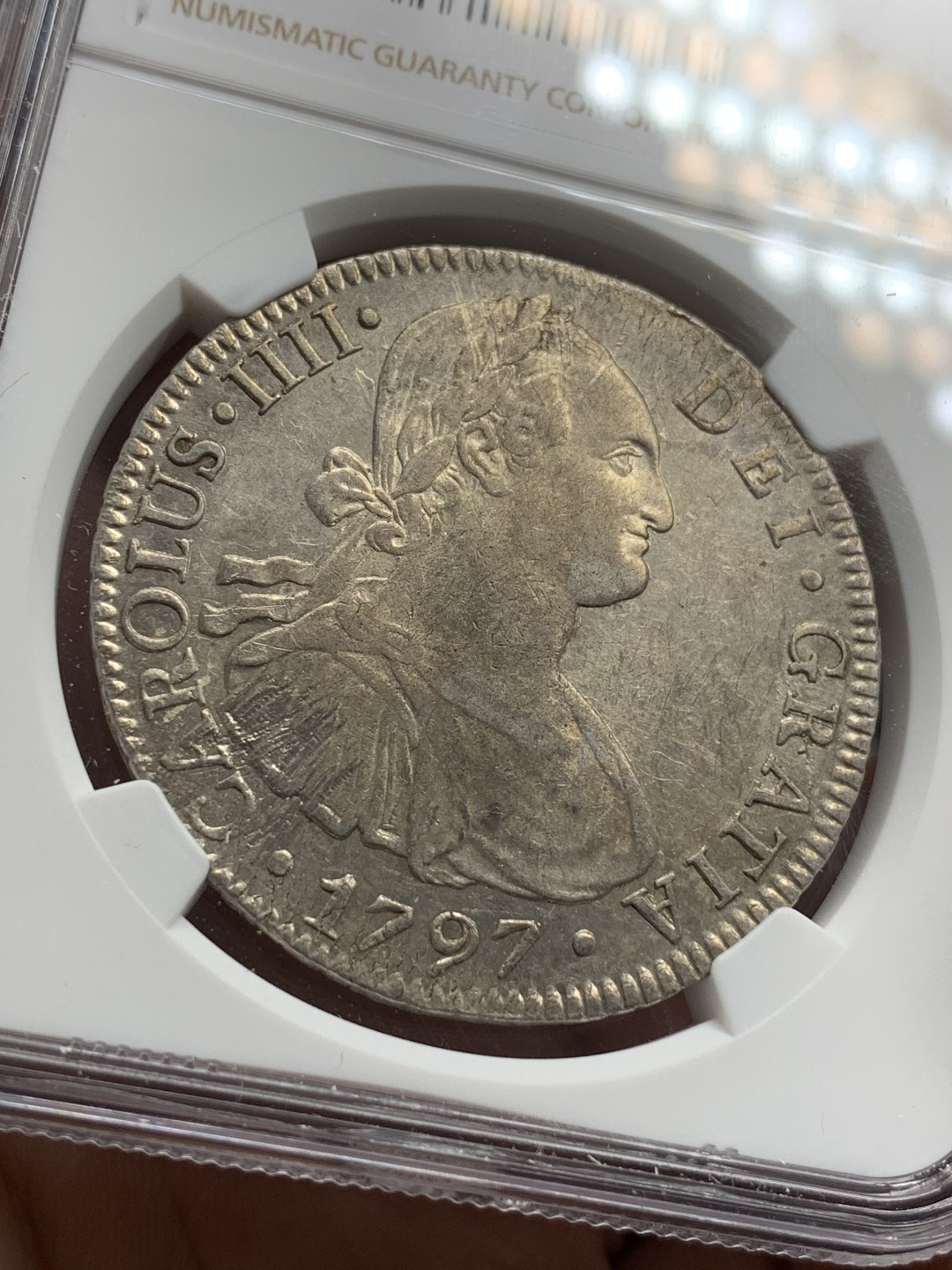 《竞宝斋》第77场-本周日，周一，周四3场拍卖（全场不限金额包邮） NGC AU 评级 墨西哥 1797年 卡四 8R 双柱银币 双面深打 包浆光度都不错