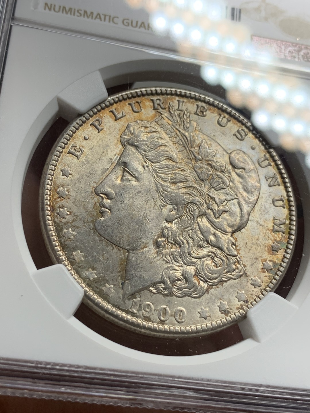 《竞宝斋》第77场-本周日，周一，周四3场拍卖（全场不限金额包邮） NGC-MS63 美国1900-O年 摩根一元大银币 原光带彩包浆 非常漂亮