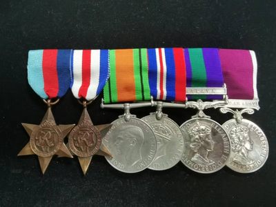 盛世勋华——号角文化勋章专场拍卖第36期 - 英国二战6联排奖章 分别为：1939-45年之星.法德之星.二战防卫奖章.二战战争奖章.常规服役带马来亚条（授予镇压马共的英军）和长期服役,其中最后两枚常规服役和长期服役均为银制，带边铭，品相如图