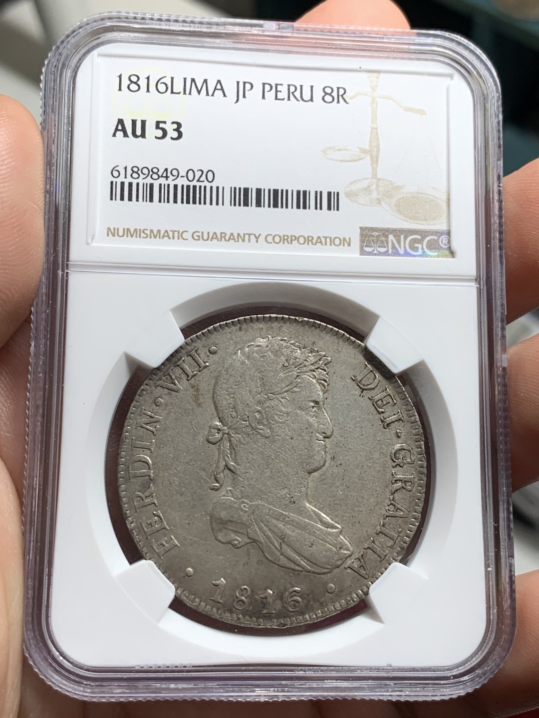 《竞宝斋》第77场-本周日，周一，周四3场拍卖（全场不限金额包邮） NGC AU53   秘鲁利马 1816年 费七 8R 双柱 大银币 原味包浆