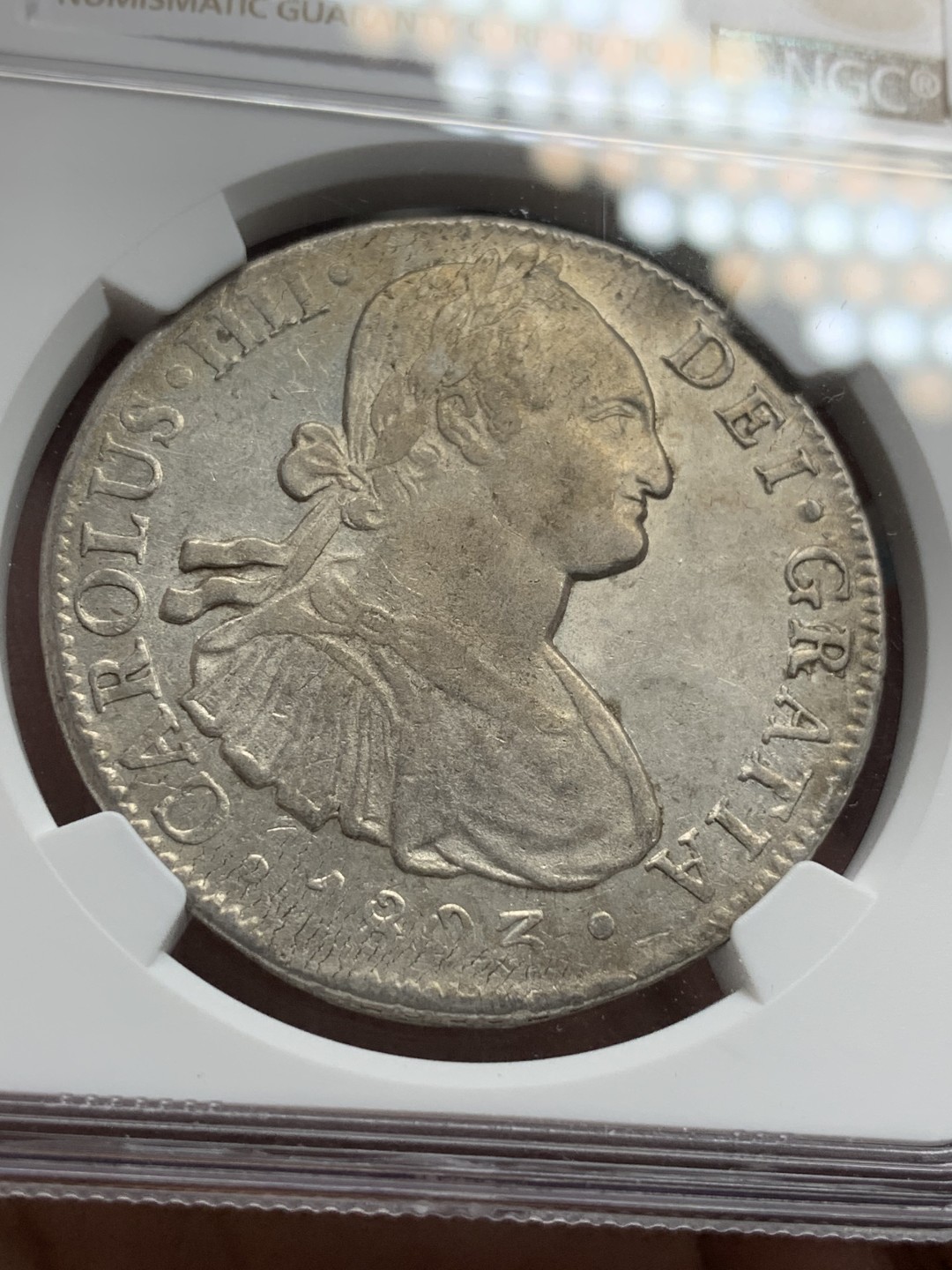 《竞宝斋》第77场-本周日，周一，周四3场拍卖（全场不限金额包邮） NGC AU50 评级 墨西哥 1803年 卡四 8R 双柱银币 双面深打 细节非常好