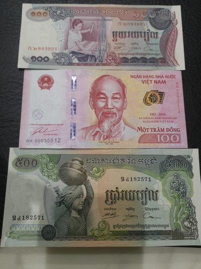《外钞收藏家》第一百九十一期 - 柬埔寨两张加越南 全新 柬埔寨100有个别潮点