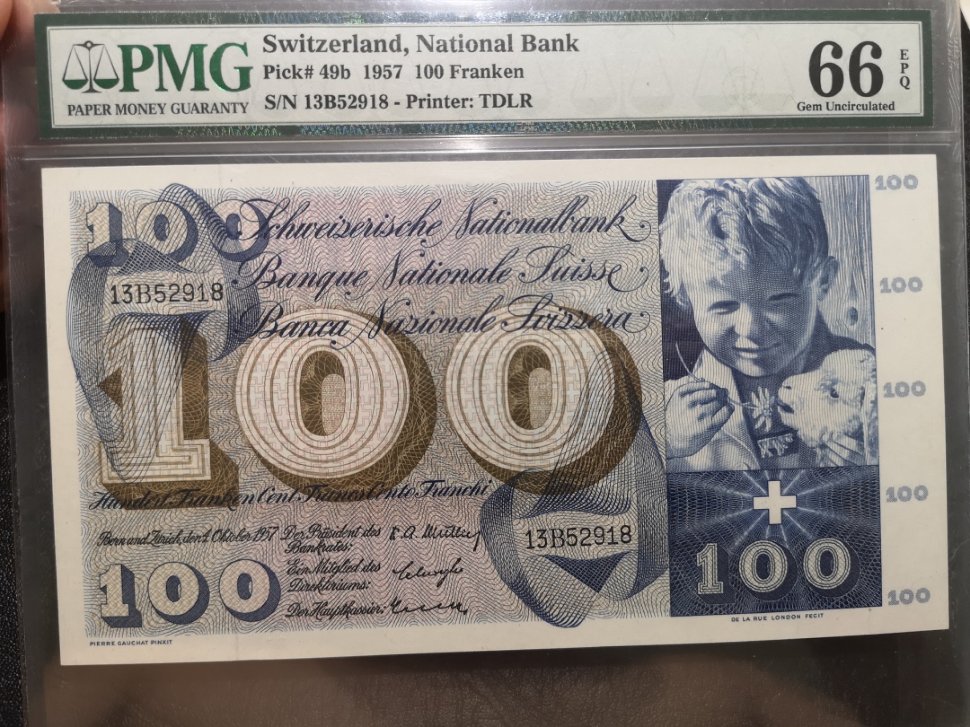 《外钞收藏家》第一百九十二期 1957年瑞士100法郎 割袍 PMG66 无47尾8