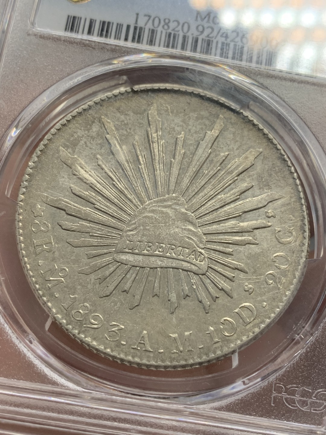 《竞宝斋》第80场-本周日，周一 2场连拍（全场不限金额包邮） PCGS AUD墨西哥 1893年 MO AM 鹰洋 淡彩包浆 状态很不错。