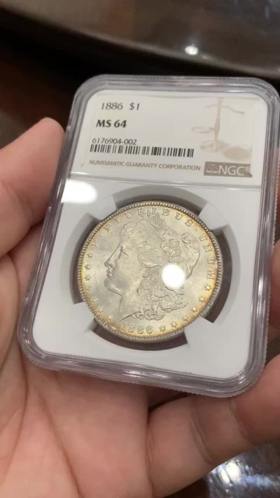 《竞宝斋》第80场-本周日，周一 2场连拍（全场不限金额包邮） NGC-MS64 美国 1886 1美元 摩根银币 原光环彩 转光犀利