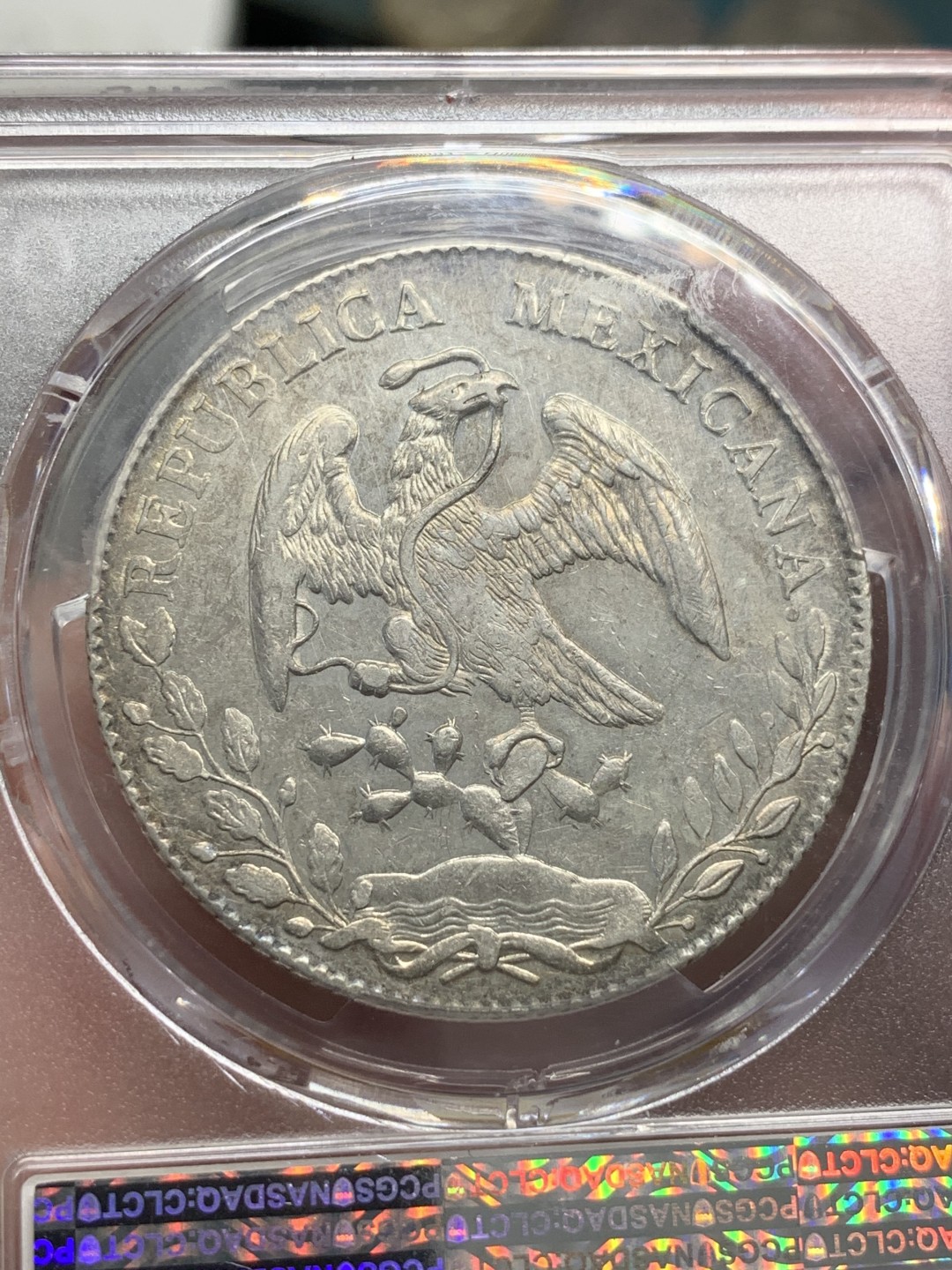 《竞宝斋》第80场-本周日，周一 2场连拍（全场不限金额包邮） PCGS AUD墨西哥 1893年 MO AM 鹰洋 淡彩包浆 状态很不错。