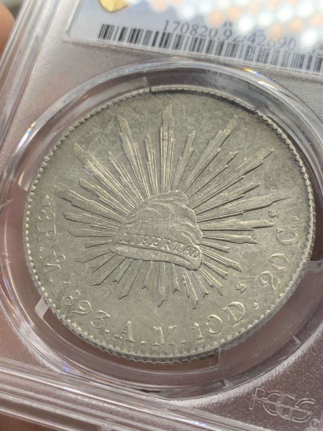 《竞宝斋》第80场-本周日，周一 2场连拍（全场不限金额包邮） PCGS AUD墨西哥 1893年 MO AM 鹰洋 淡彩包浆 状态很不错。