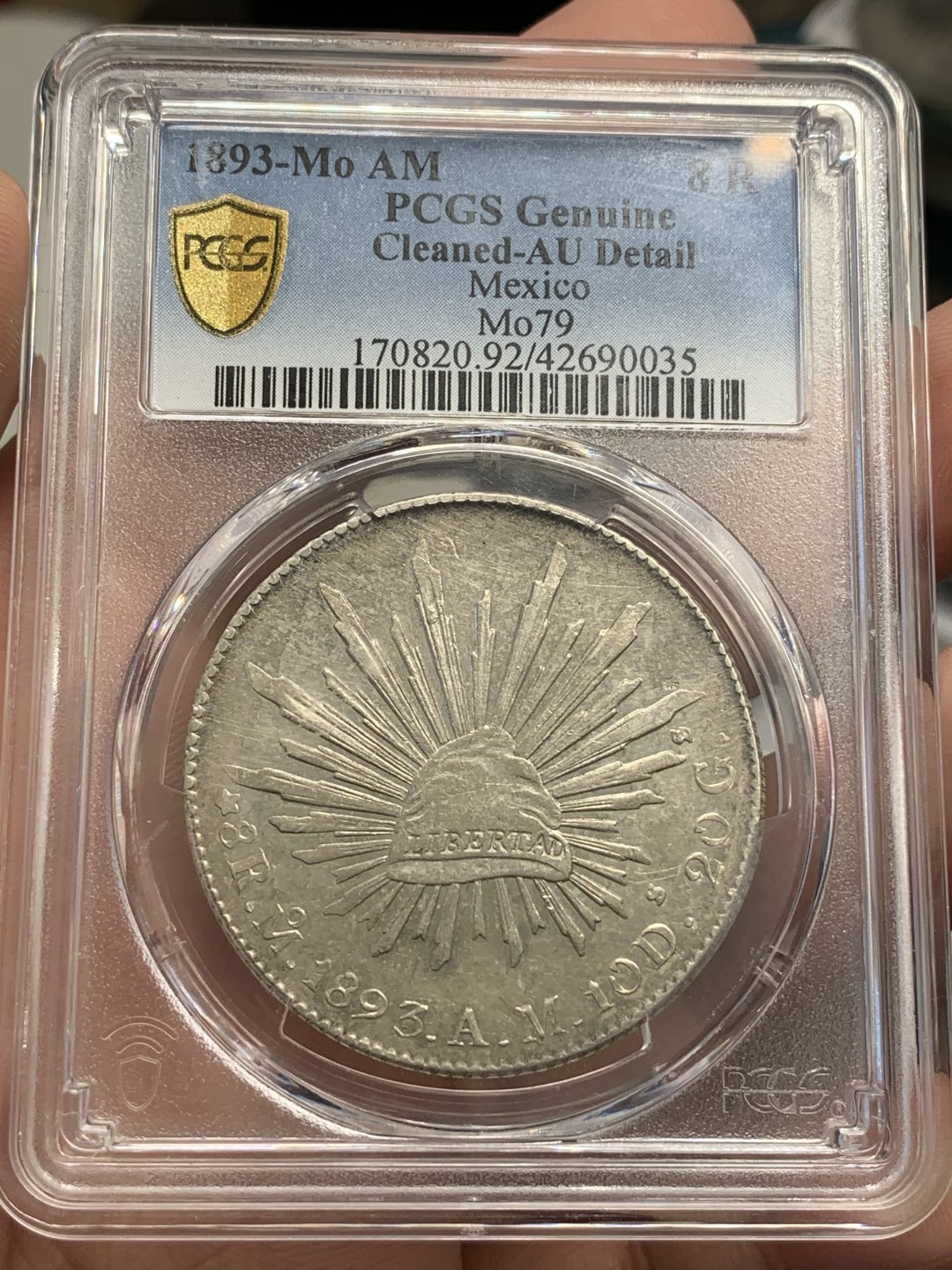 《竞宝斋》第80场-本周日，周一 2场连拍（全场不限金额包邮） PCGS AUD墨西哥 1893年 MO AM 鹰洋 淡彩包浆 状态很不错。