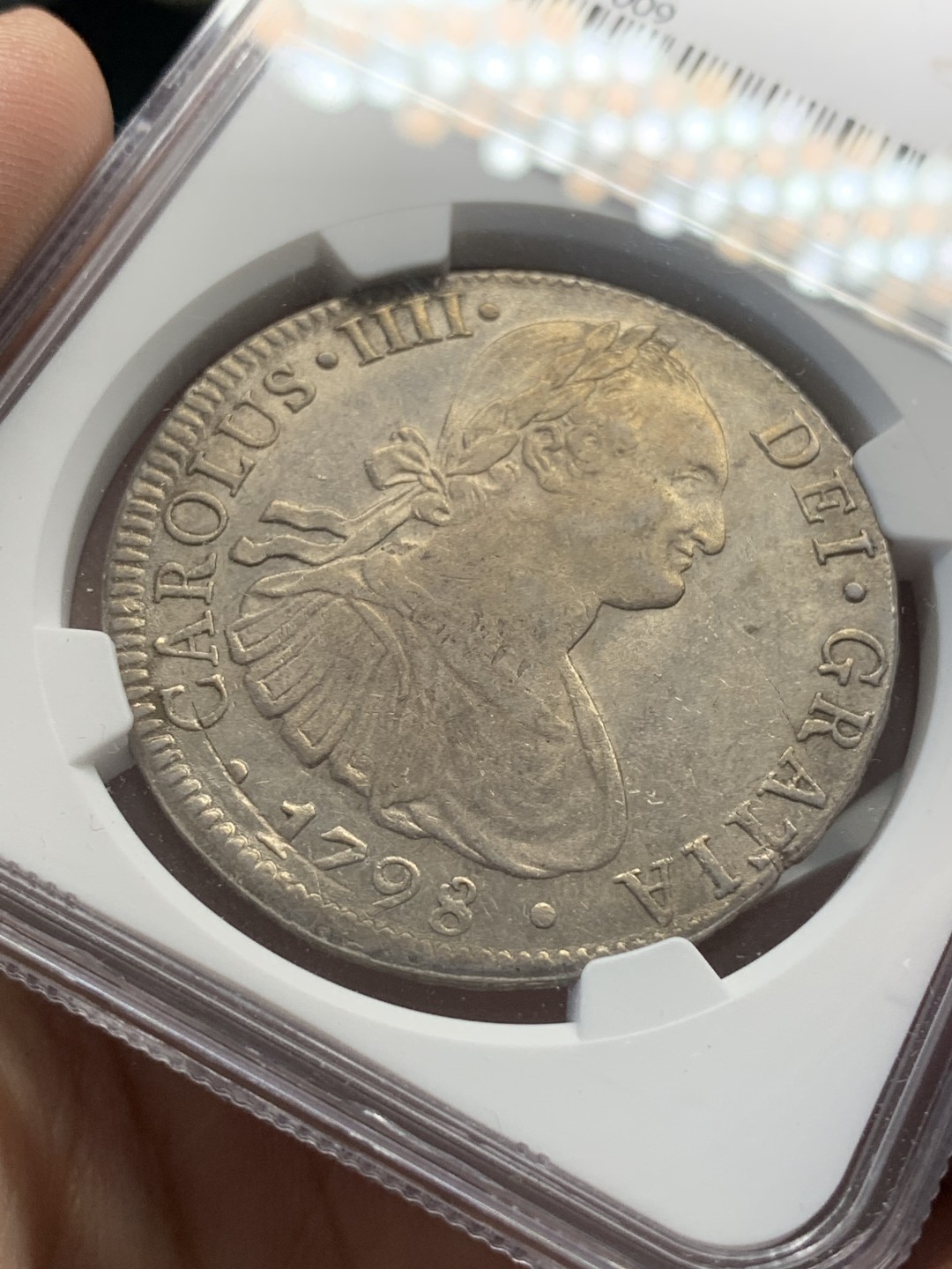 《竞宝斋》第80场-本周日，周一 2场连拍（全场不限金额包邮） NGC AU55 墨西哥 1798年 早期版 卡四 8R 双柱大银币 有光度 有细节 可藏