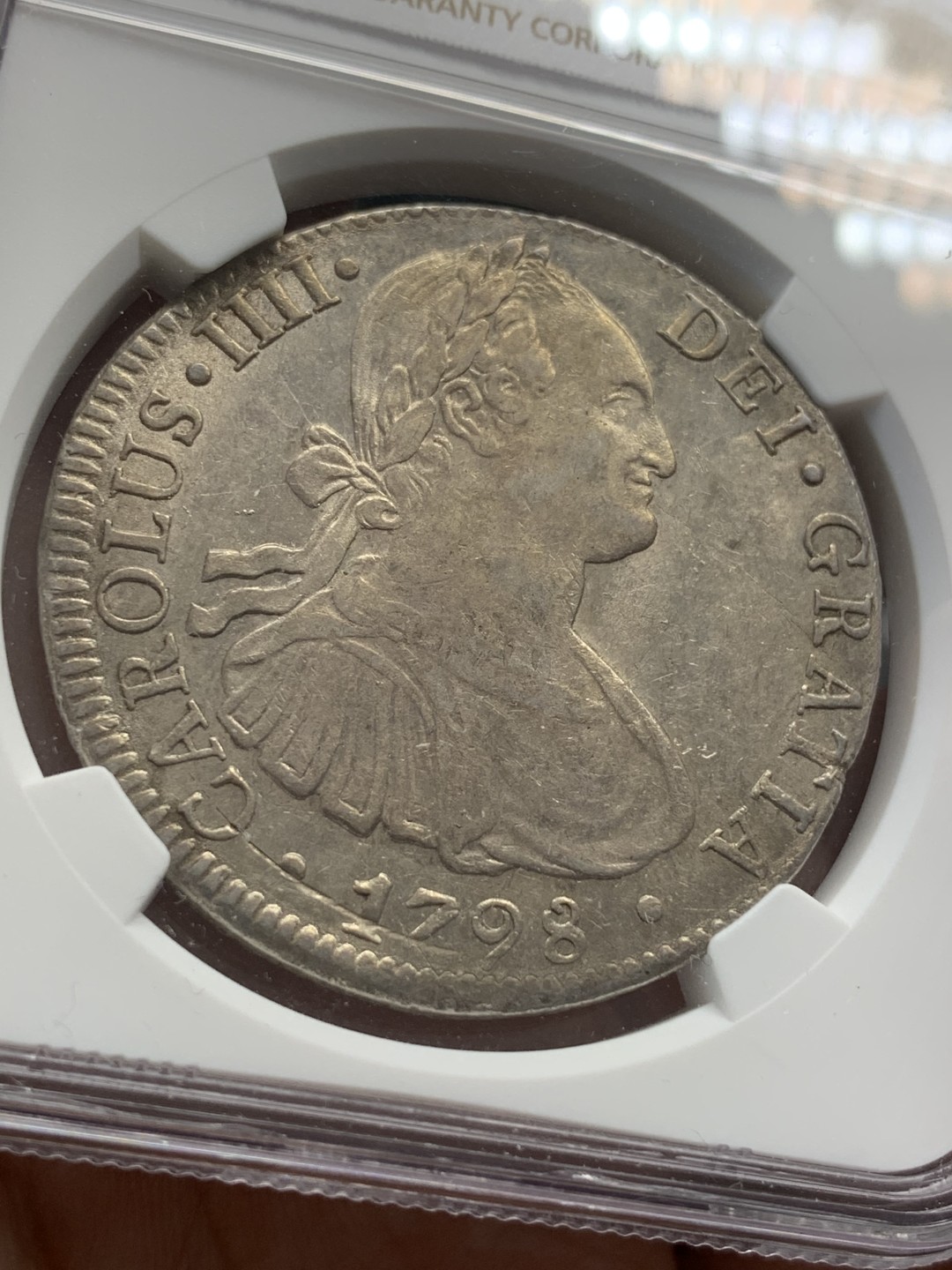 《竞宝斋》第80场-本周日，周一 2场连拍（全场不限金额包邮） NGC AU55 墨西哥 1798年 早期版 卡四 8R 双柱大银币 有光度 有细节 可藏