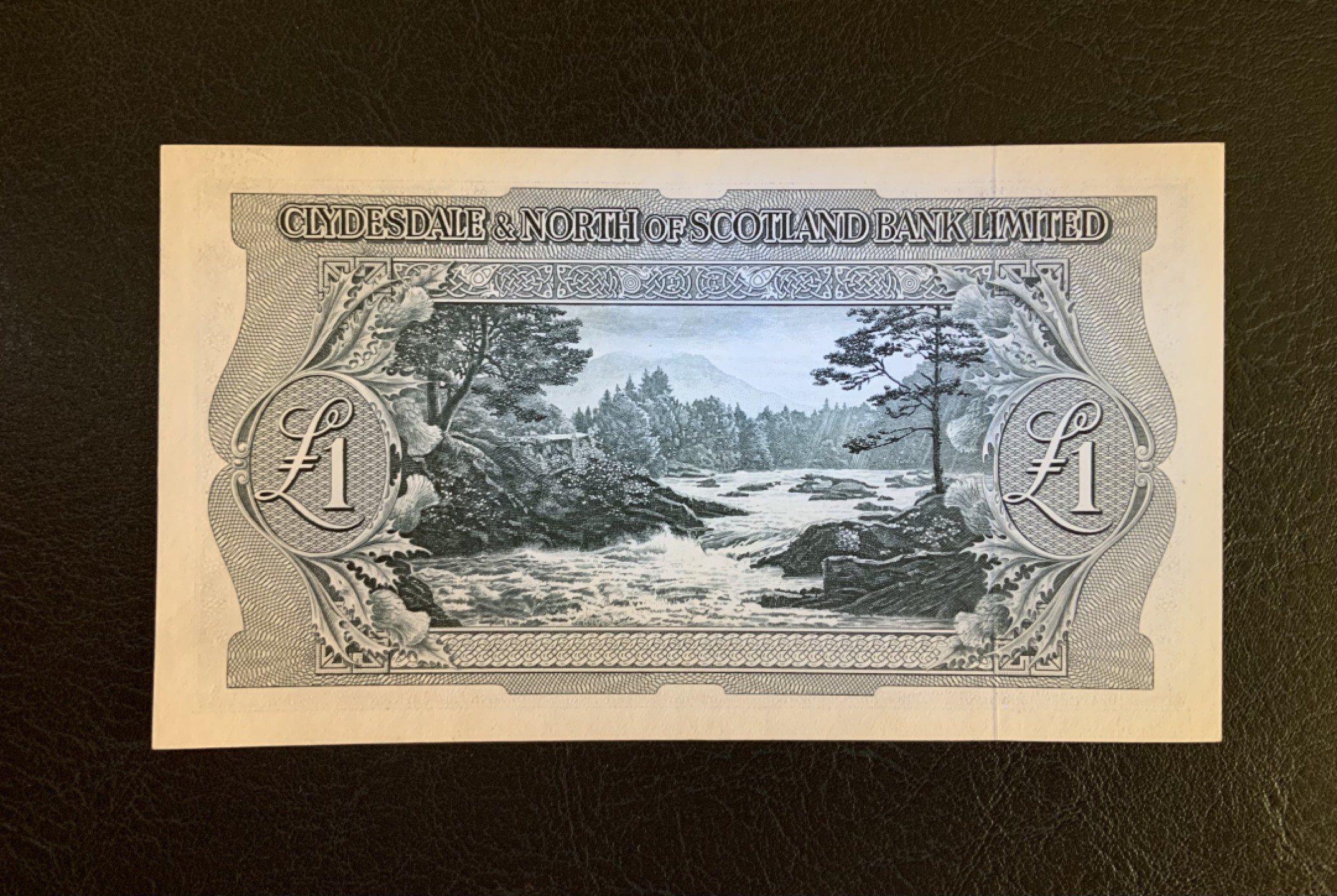 收藏联盟Quantum Auction 第182期拍卖 苏格兰1958年三行联合发行1镑 品相AU 轻微中折 pmg58e剪壳裸币