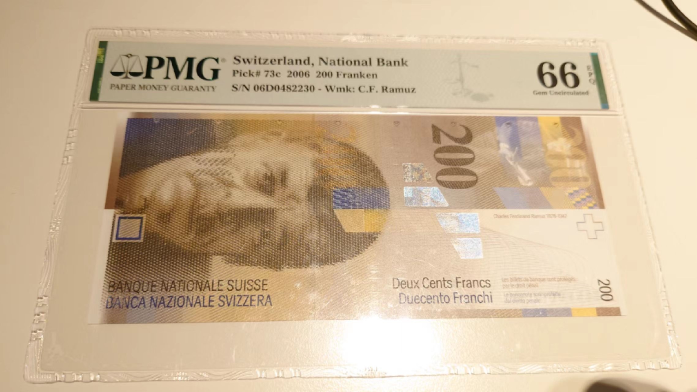 8月7日今日晚八点半【囧羊收藏】精选微拍第47期暨2022年第四期  众多精选新品 【一口价已售出，请勿出价】2006年瑞士200法郎 人像版 PMG66E 