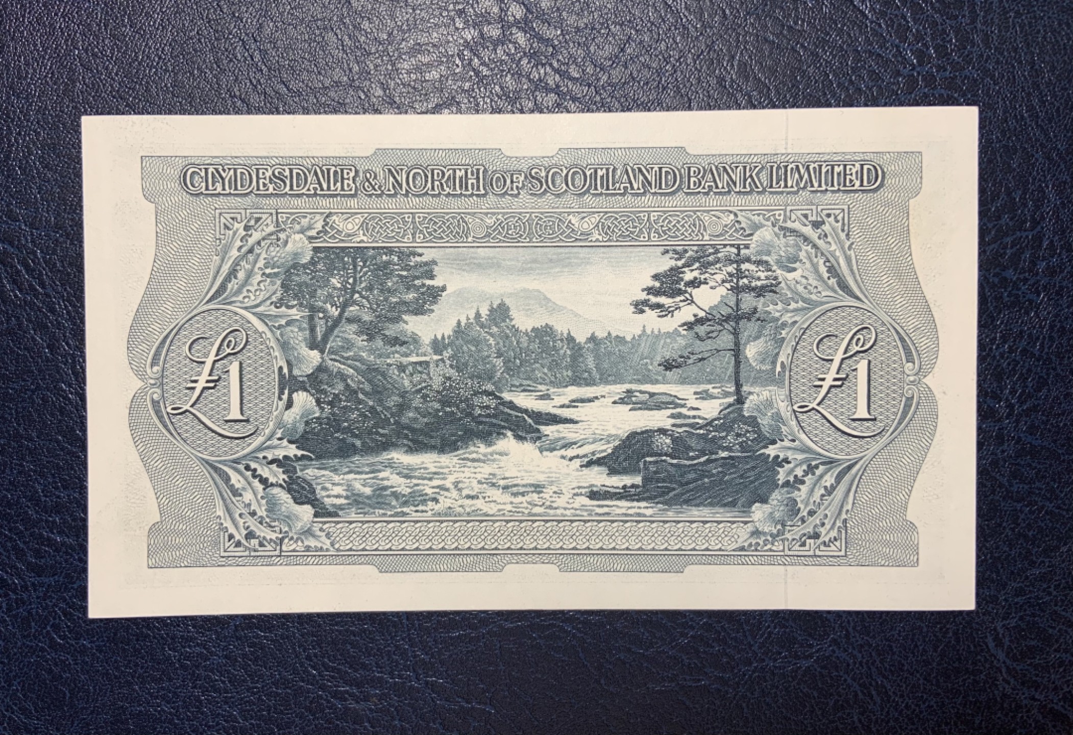 收藏联盟Quantum Auction 第182期拍卖 苏格兰1958年三行联合发行1镑 品相AU 轻微中折 pmg58e剪壳裸币