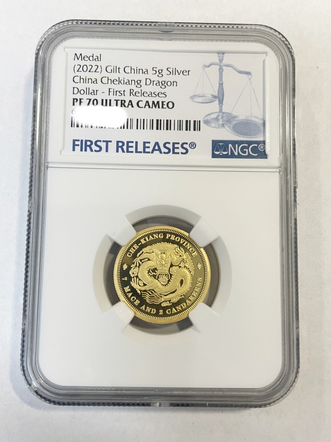 周末快乐 浙江光绪元宝镀金5克银章评级NGC70