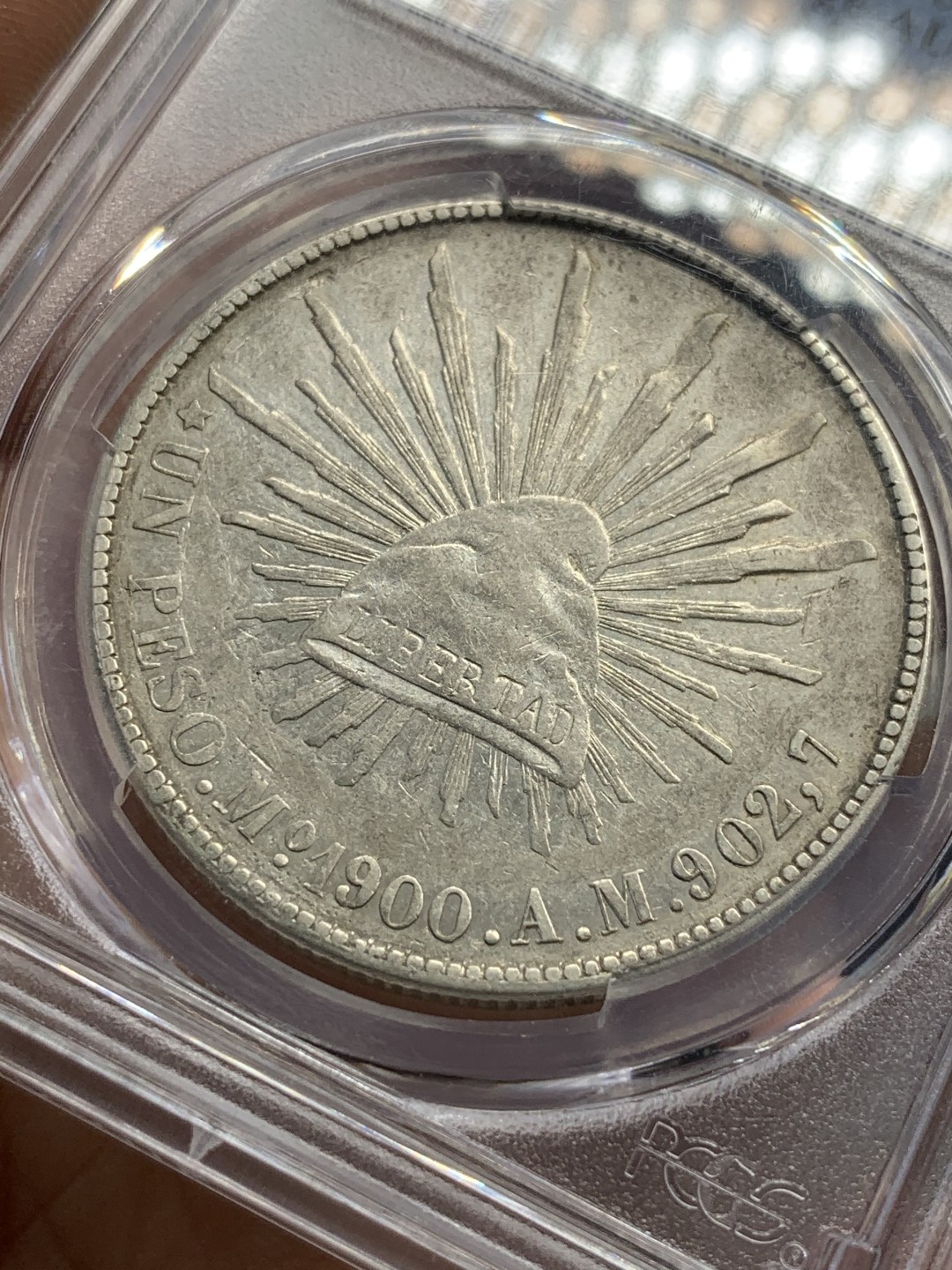 《竞宝斋》第82场-本周日，周一，周四3场拍卖（全场不限金额包邮） PCGS AUD 墨西哥 1900年 直边 鹰洋 银币 细节不错，可惜背面有小伤