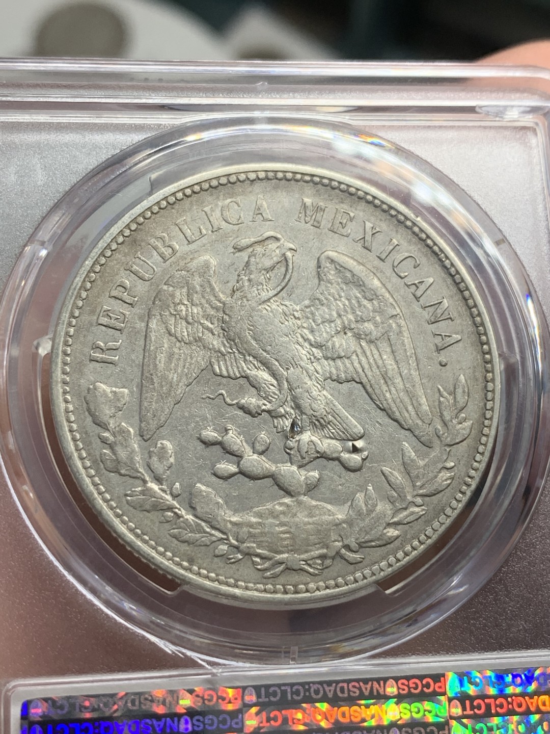 《竞宝斋》第82场-本周日，周一，周四3场拍卖（全场不限金额包邮） PCGS AUD 墨西哥 1900年 直边 鹰洋 银币 细节不错，可惜背面有小伤