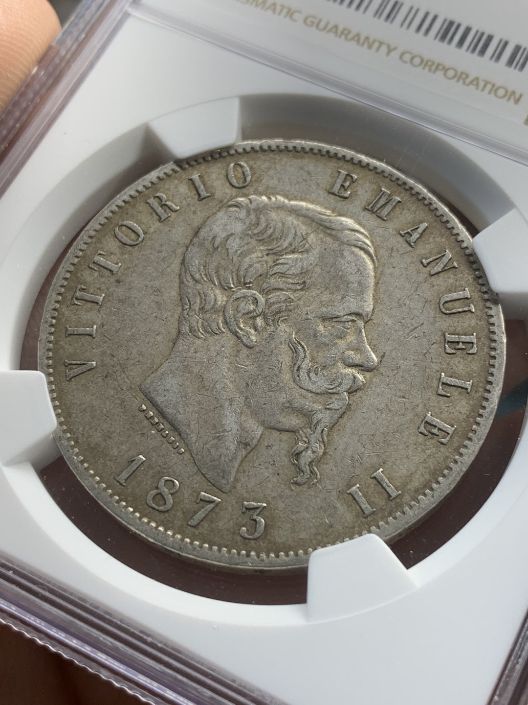 《竞宝斋》第82场-本周日，周一，周四3场拍卖（全场不限金额包邮） NGC-AU55 意大利1873-M年 艾曼纽尔二世 5里拉大银币 原味好品