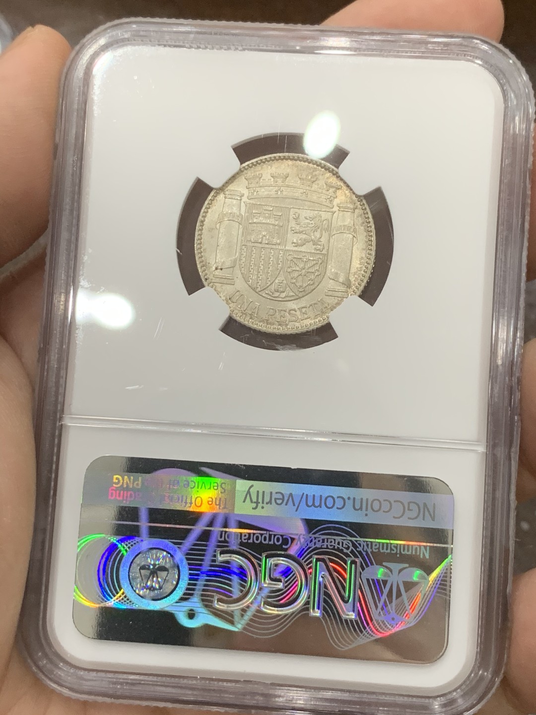 《竞宝斋》第82场-本周日，周一，周四3场拍卖（全场不限金额包邮） NGC-MS65 西班牙1933年 内战版1比塞塔拿花 银币 顶级分数 最近国外也是暴涨的品种