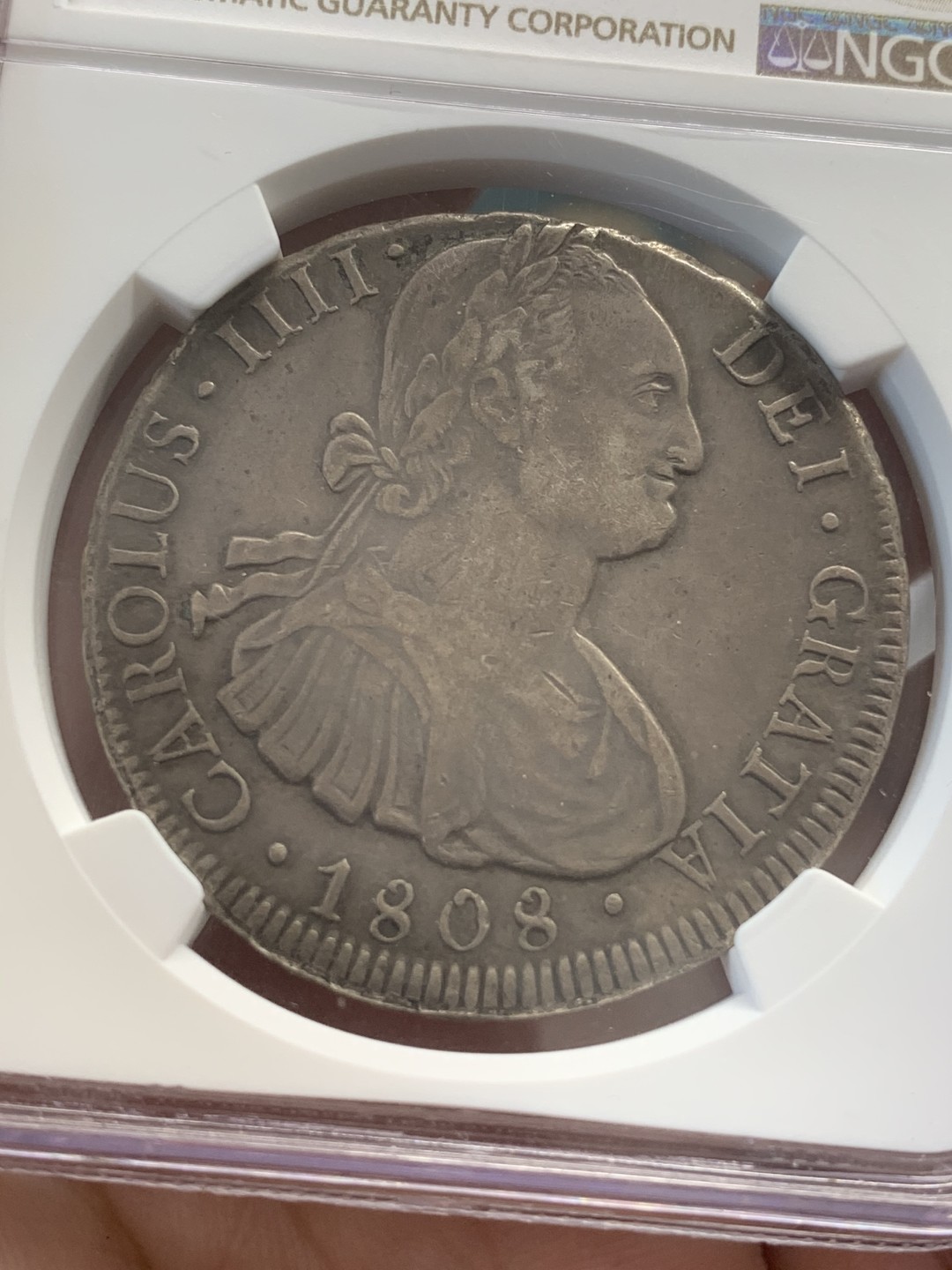 《竞宝斋》第83场-本周日，周一2场连拍（全场不限金额包邮） NGC VF35 老包浆1808年玻利维亚卡洛斯四世双柱8里亚尔银币