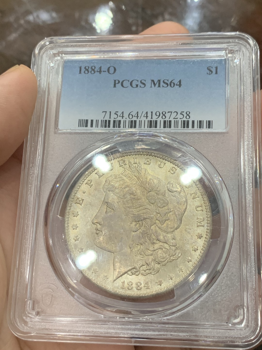 《竞宝斋》第83场-本周日，周一2场连拍（全场不限金额包邮） PCGS-MS64 美国 1884年O版 1美元 五彩摩根银币 原光转光 极佳视觉效果