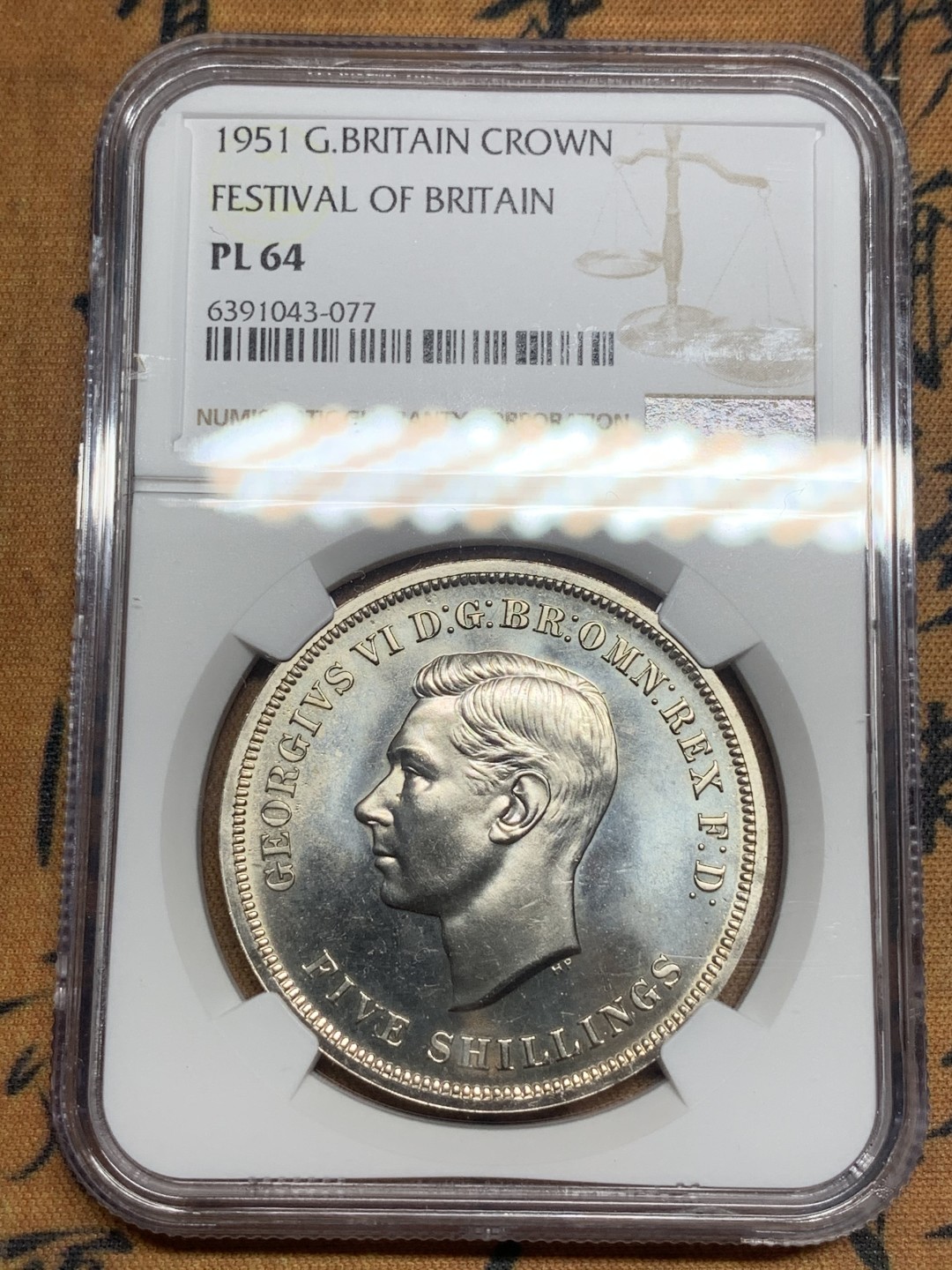 《竞宝斋》第83场-本周日，周一2场连拍（全场不限金额包邮） 英国 1951年乔治六世一克朗 NGC PL64 全银光好品相