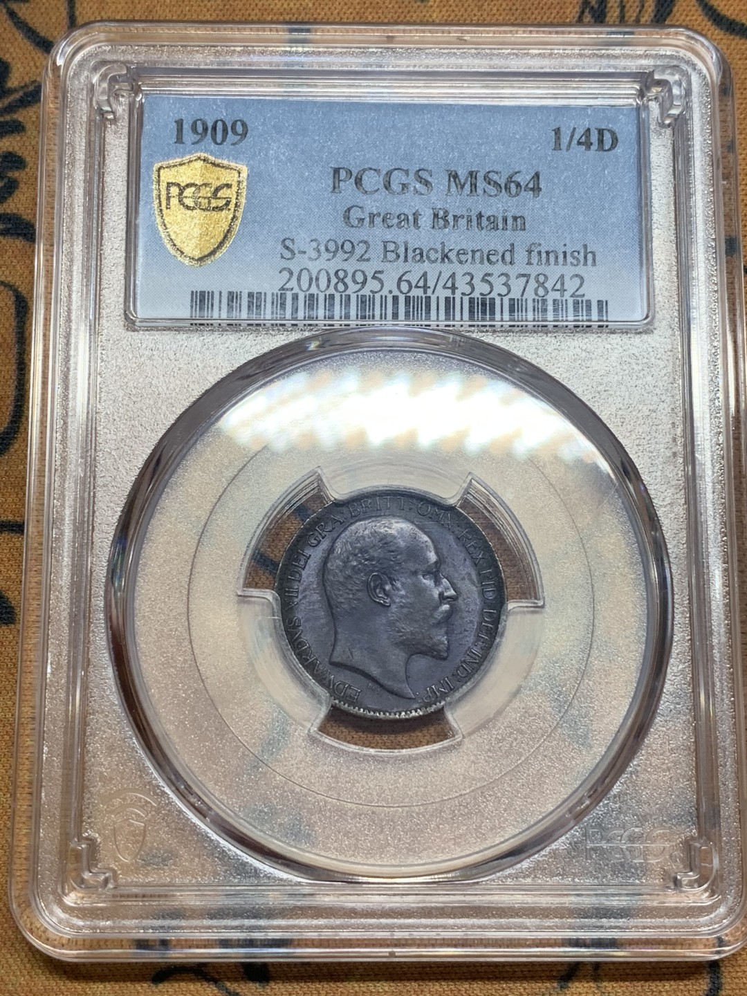 《竞宝斋》第83场-本周日，周一2场连拍（全场不限金额包邮） PCGS-MS64 英国 1909年 爱七 1/4便士 少见发黑处理 更高分就三枚65 2019年45分成交记录1900（见图）