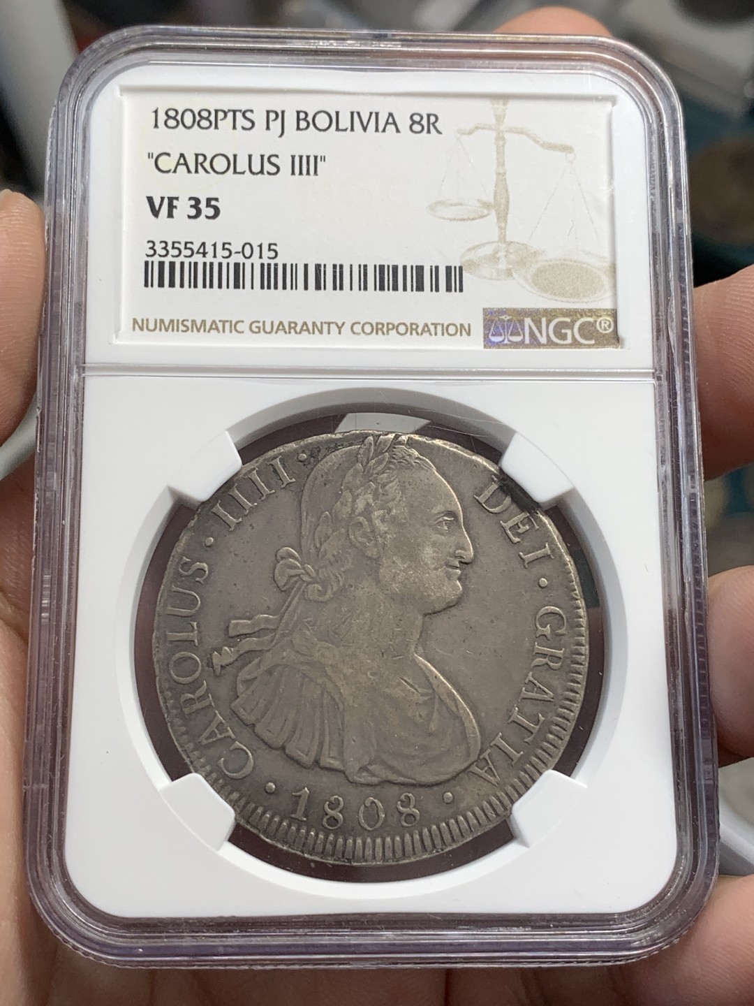 《竞宝斋》第83场-本周日，周一2场连拍（全场不限金额包邮） NGC VF35 老包浆1808年玻利维亚卡洛斯四世双柱8里亚尔银币