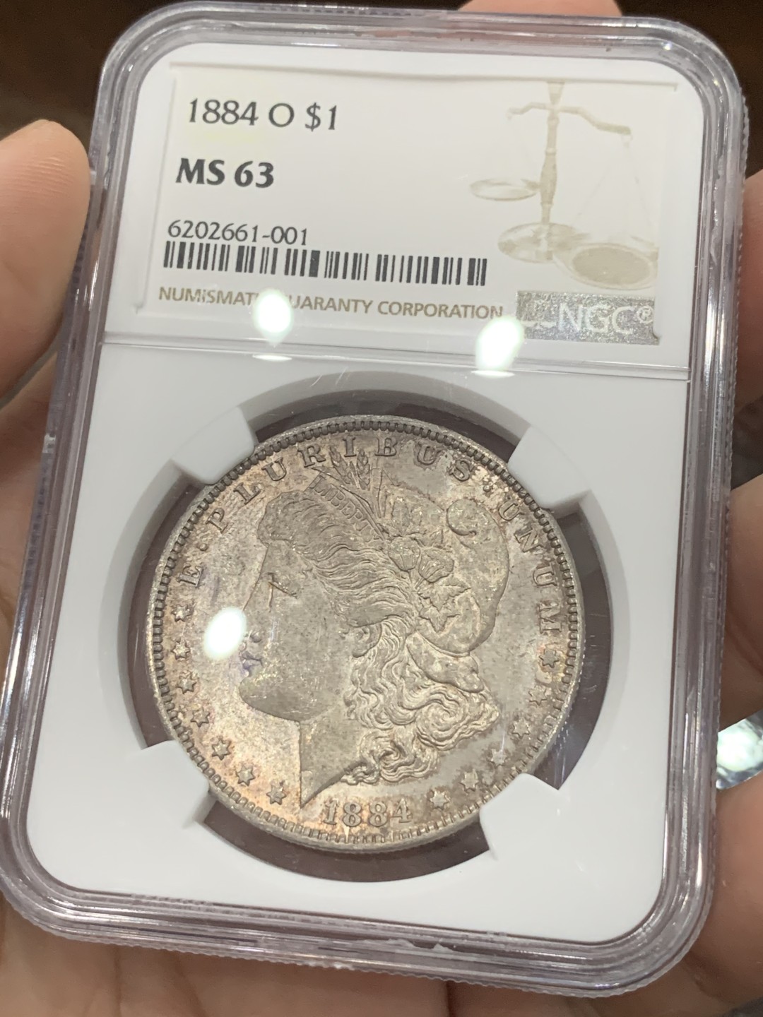 《竞宝斋》第83场-本周日，周一2场连拍（全场不限金额包邮） NGC MS63 1884年 美国摩根一元 五彩包浆