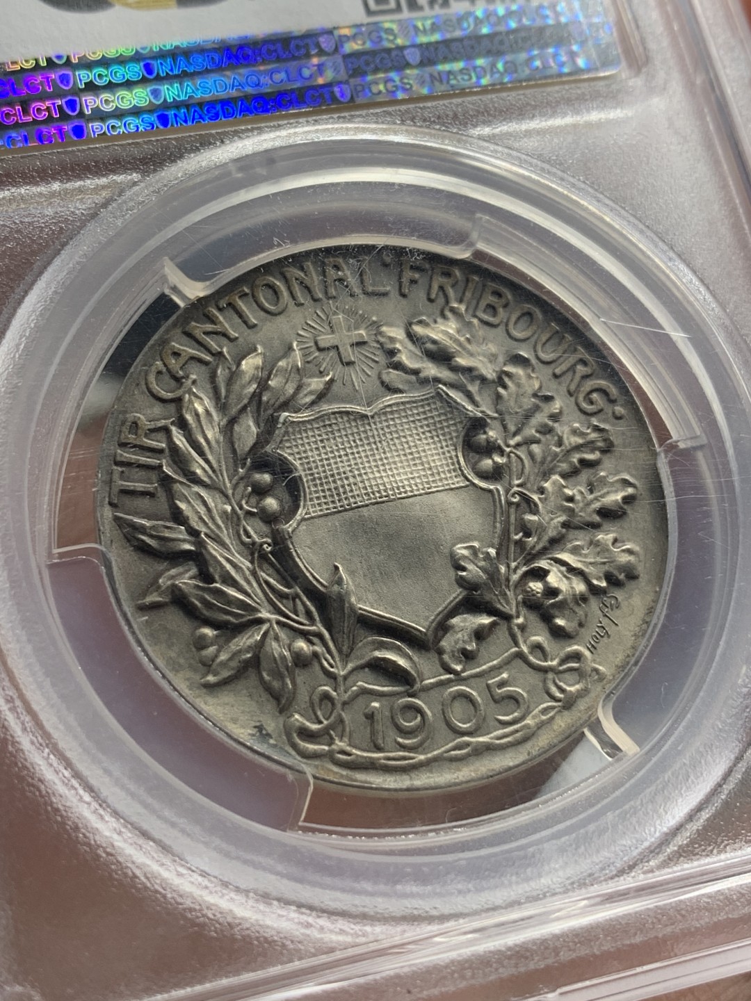 《竞宝斋》第83场-本周日，周一2场连拍（全场不限金额包邮） PCGS SP64 瑞士1905年弗里堡射击节女神城市景观高浮雕银章 精美大气 顶级品相