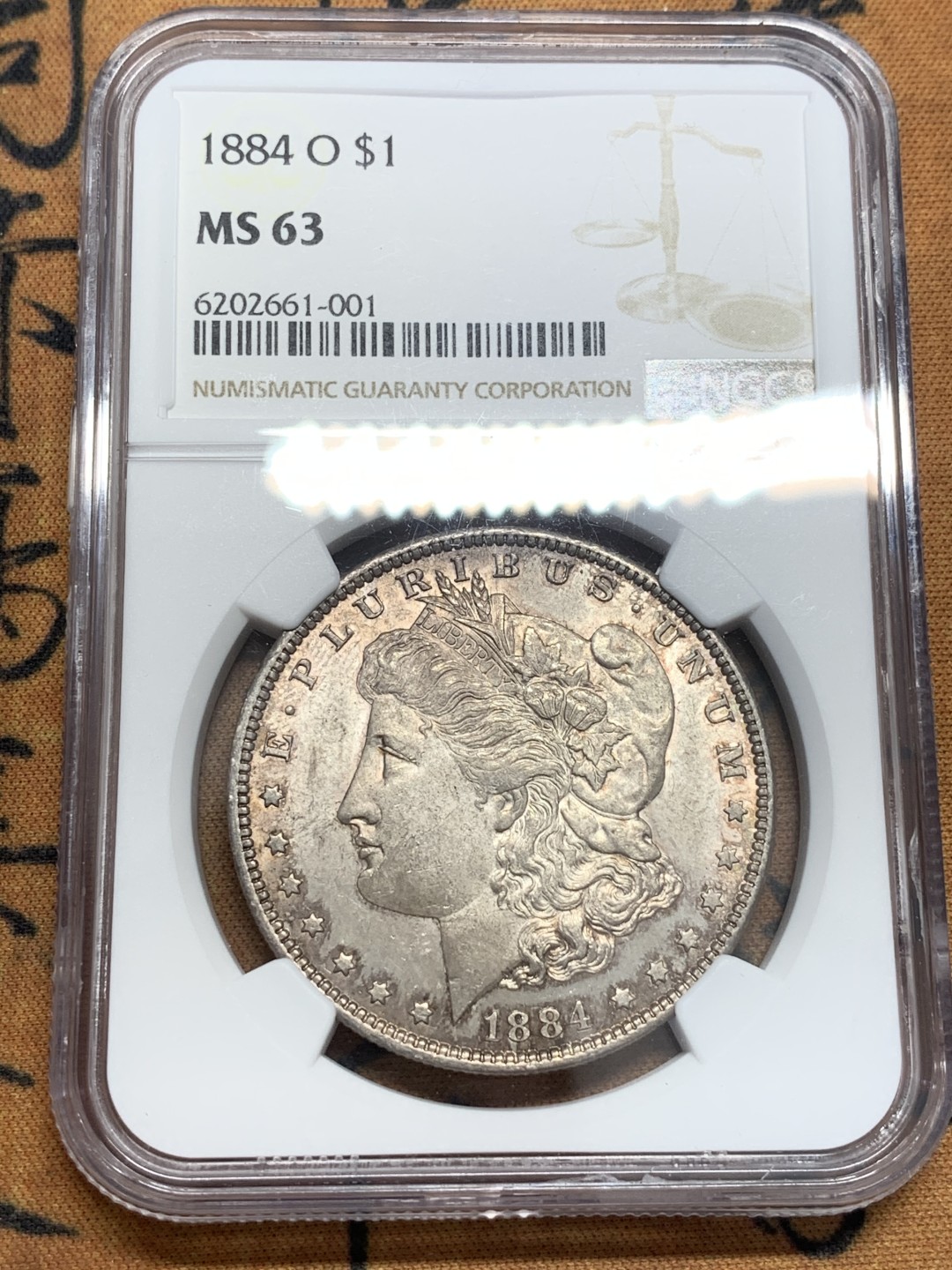 《竞宝斋》第83场-本周日，周一2场连拍（全场不限金额包邮） NGC MS63 1884年 美国摩根一元 五彩包浆