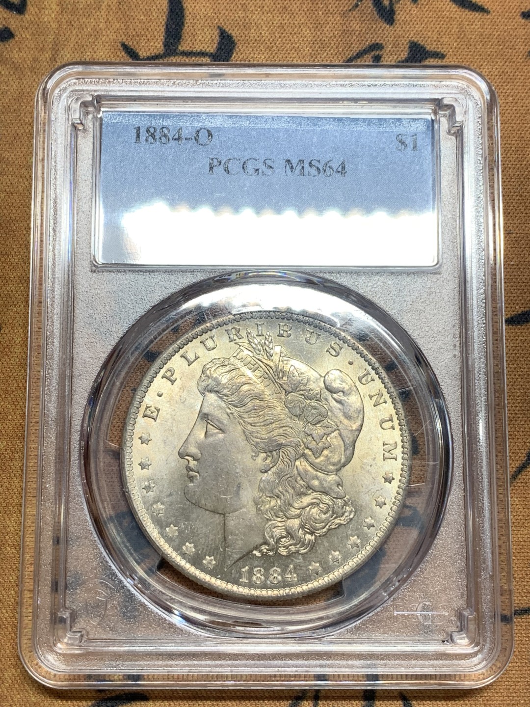 《竞宝斋》第83场-本周日，周一2场连拍（全场不限金额包邮） PCGS-MS64 美国 1884年O版 1美元 五彩摩根银币 原光转光 极佳视觉效果