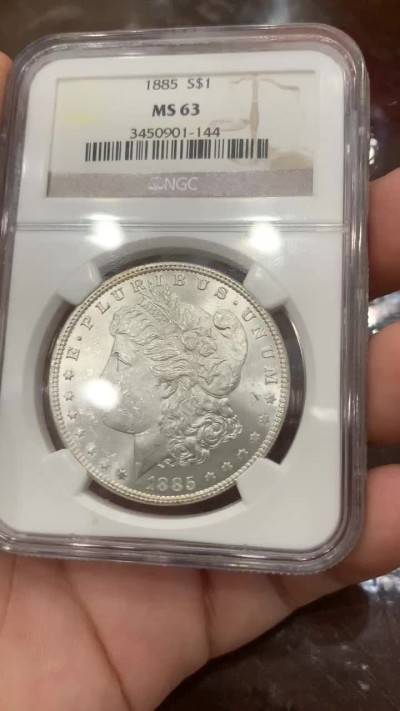 《竞宝斋》第83场-本周日，周一2场连拍（全场不限金额包邮） NGC-MS63 美国 1885年  摩根 1美元 银币 月牙彩
