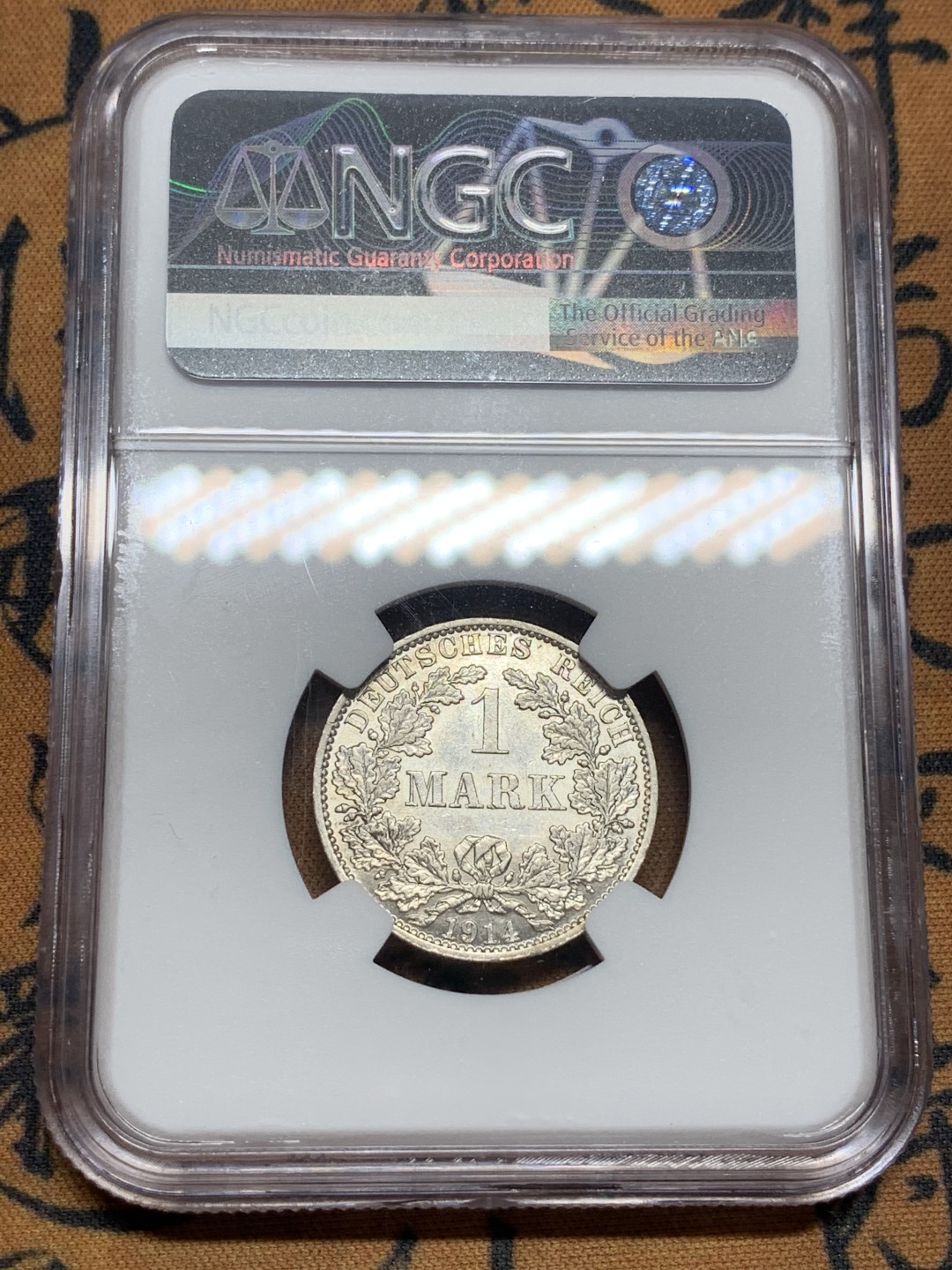 《竞宝斋》第84场-本周日，周一2场连拍（全场不限金额包邮） NGC-MS60 德国1914年A版1马克。少见分数。