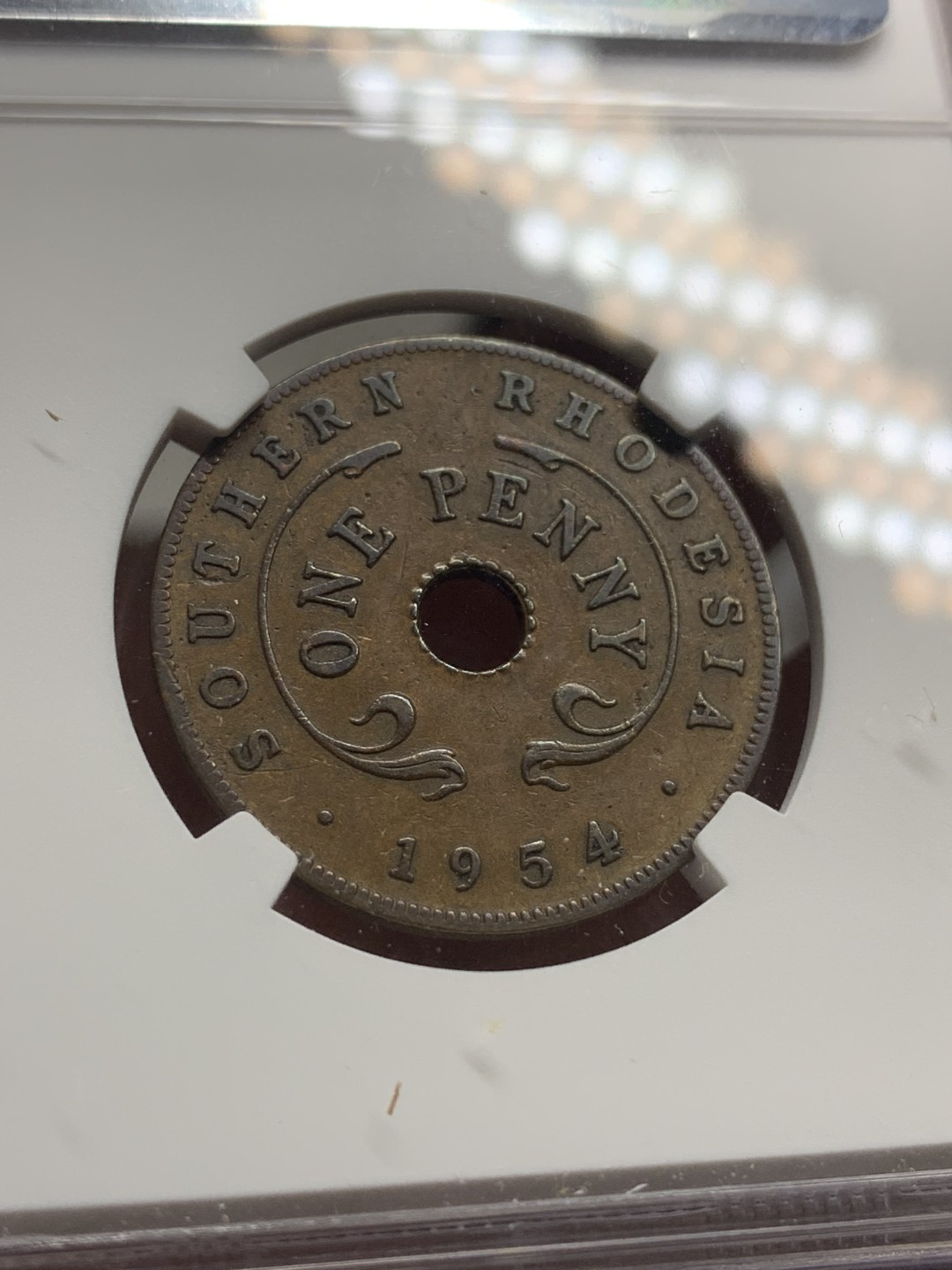 《竞宝斋》第84场-本周日，周一2场连拍（全场不限金额包邮） NGC-AU58 南罗德西亚1954年1便士。独立版别。流通充分。克书好品价格巨高。